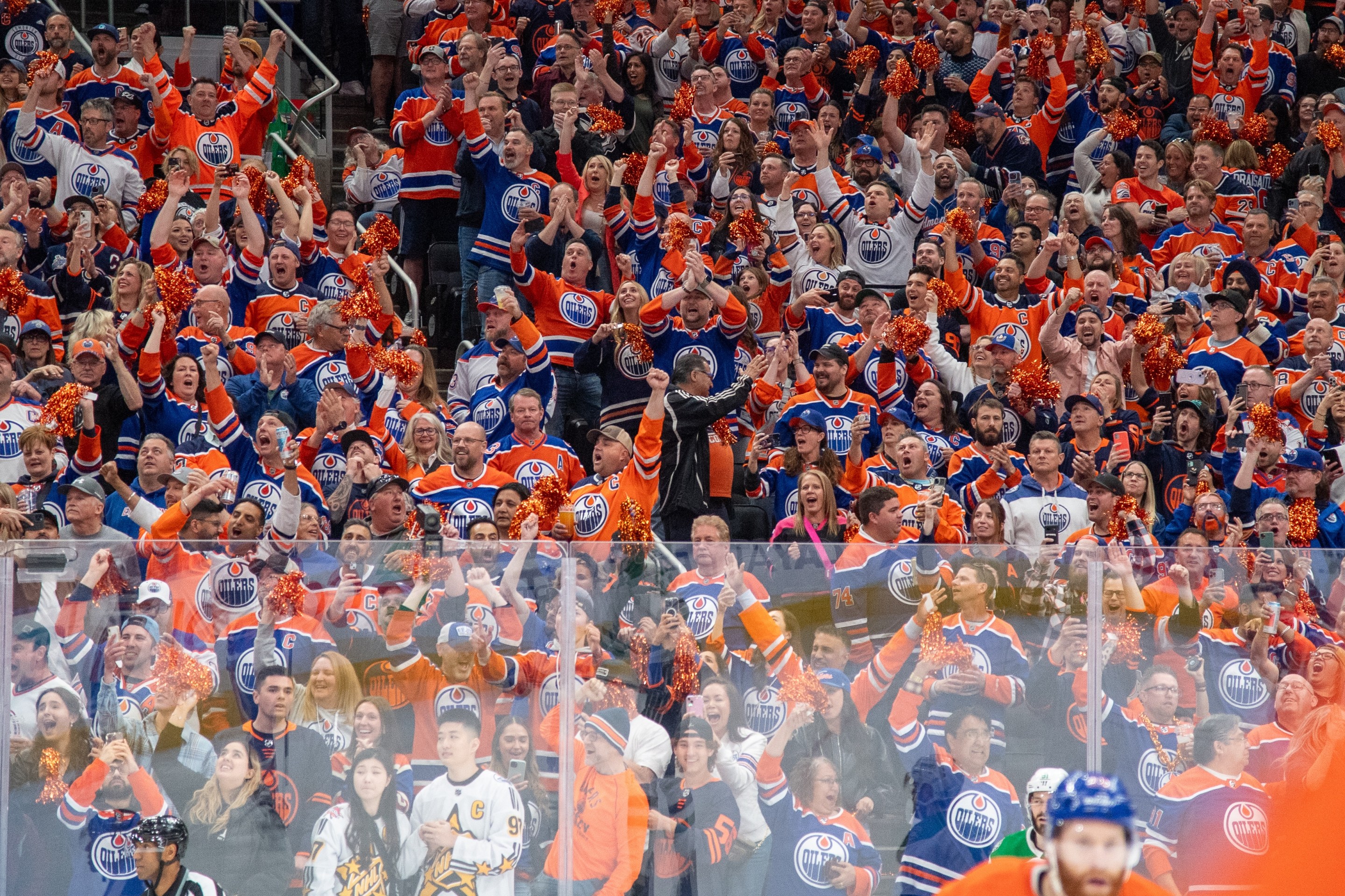 EDMONTON, CANADA - JUNE 02: Fans cheer on the Edmonton Oilers in Game Six of the Western Conference Final of the 2024 Stanley Cup Playoffs against the Dallas Stars at Rogers Place on June 2, 2024, in Edmonton, Alberta, Canada. (Photo by Andy Devlin/NHLI via Getty Images)