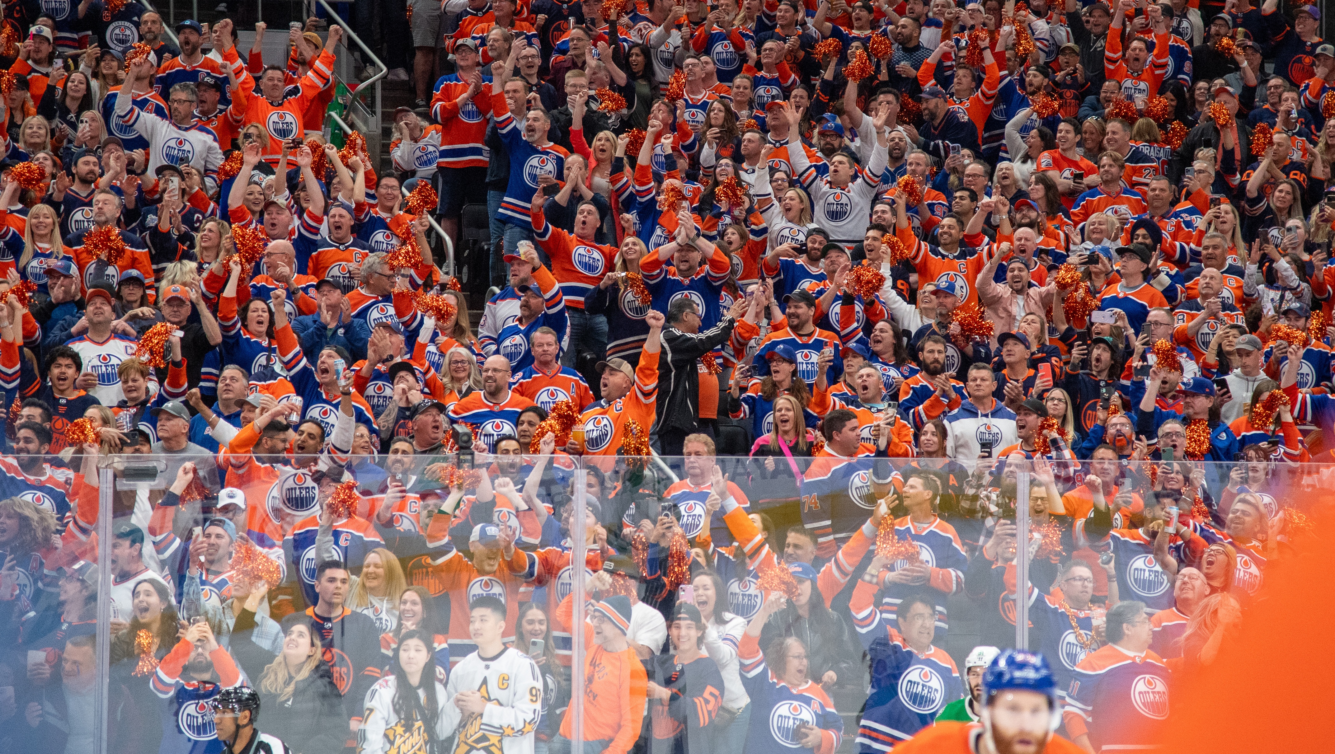 EDMONTON, CANADA - JUNE 02: Fans cheer on the Edmonton Oilers in Game Six of the Western Conference Final of the 2024 Stanley Cup Playoffs against the Dallas Stars at Rogers Place on June 2, 2024, in Edmonton, Alberta, Canada. (Photo by Andy Devlin/NHLI via Getty Images)