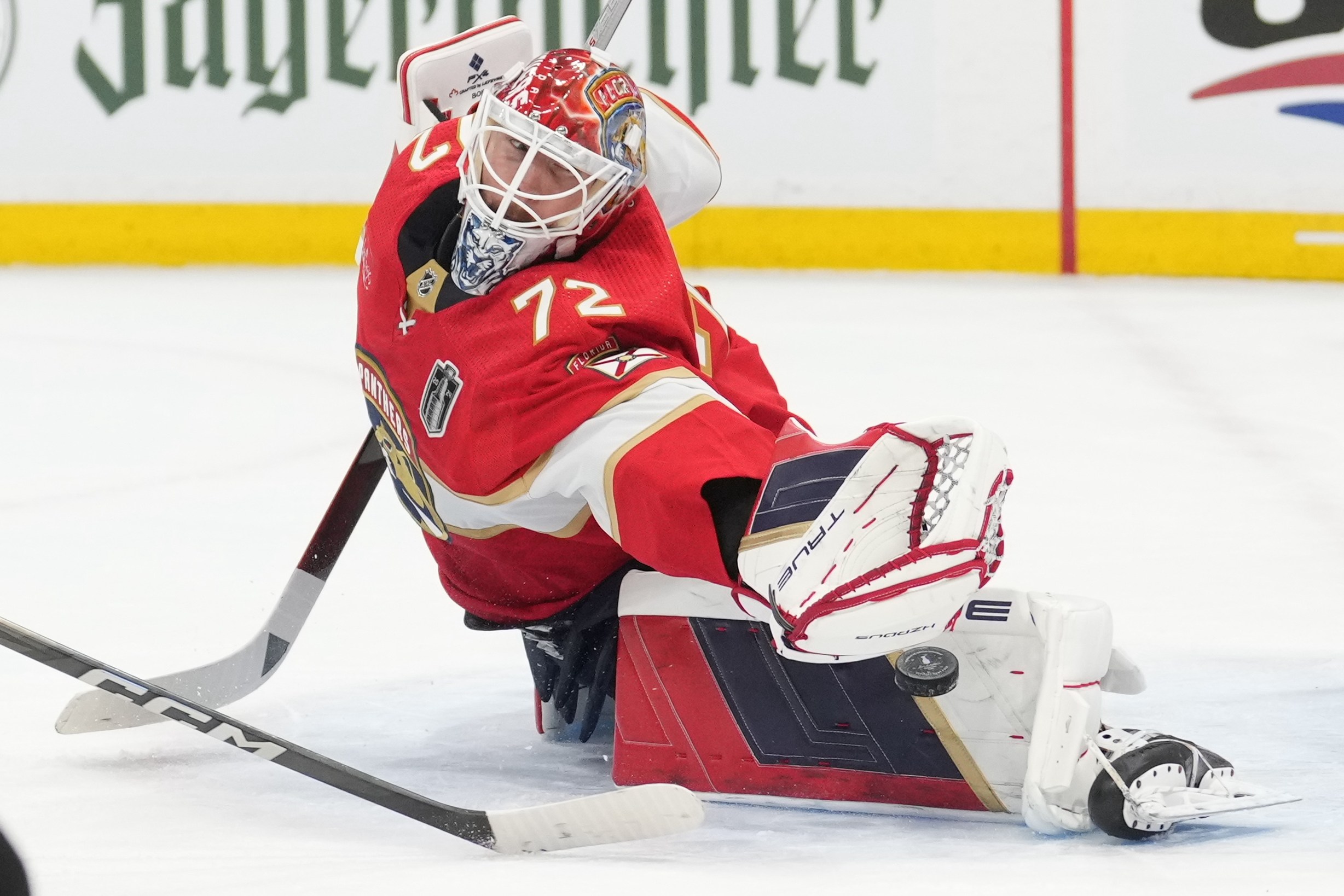 SUNRISE, FL - JUNE 08: Florida Panthers goaltender Sergei Bobrovsky (72) makes a tough save in the first period during game one of the Stanley Cup Finals between the Edmonton Oilers and the Florida Panthers on Saturday, June 8, 2024 at Amerant Bank Area in Sunrise, Fla. (Photo by Peter Joneleit/Icon Sportswire via Getty Images)