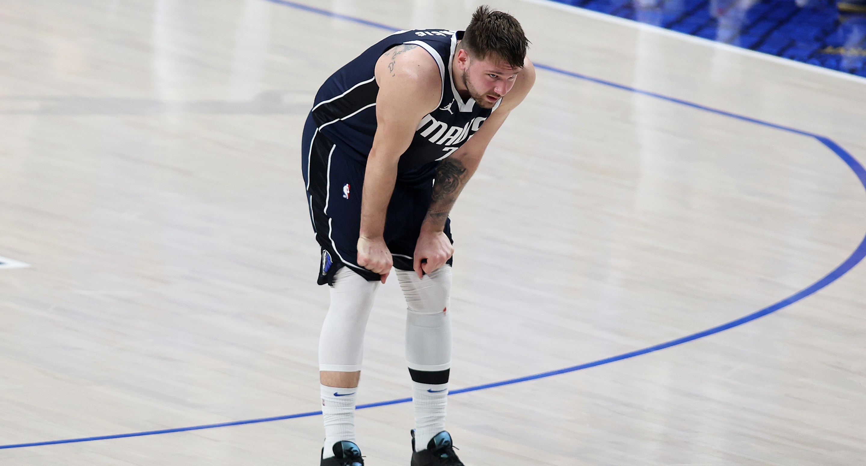 DALLAS, TEXAS - JUNE 12: Luka Dončić #77 of the Dallas Mavericks looks on in the fourth quarter against the Boston Celtics in Game Three of the 2024 NBA Finals at American Airlines Center on June 12, 2024 in Dallas, Texas. NOTE TO USER: User expressly acknowledges and agrees that, by downloading and or using this photograph, User is consenting to the terms and conditions of the Getty Images License Agreement. (Photo by Tim Heitman/Getty Images)