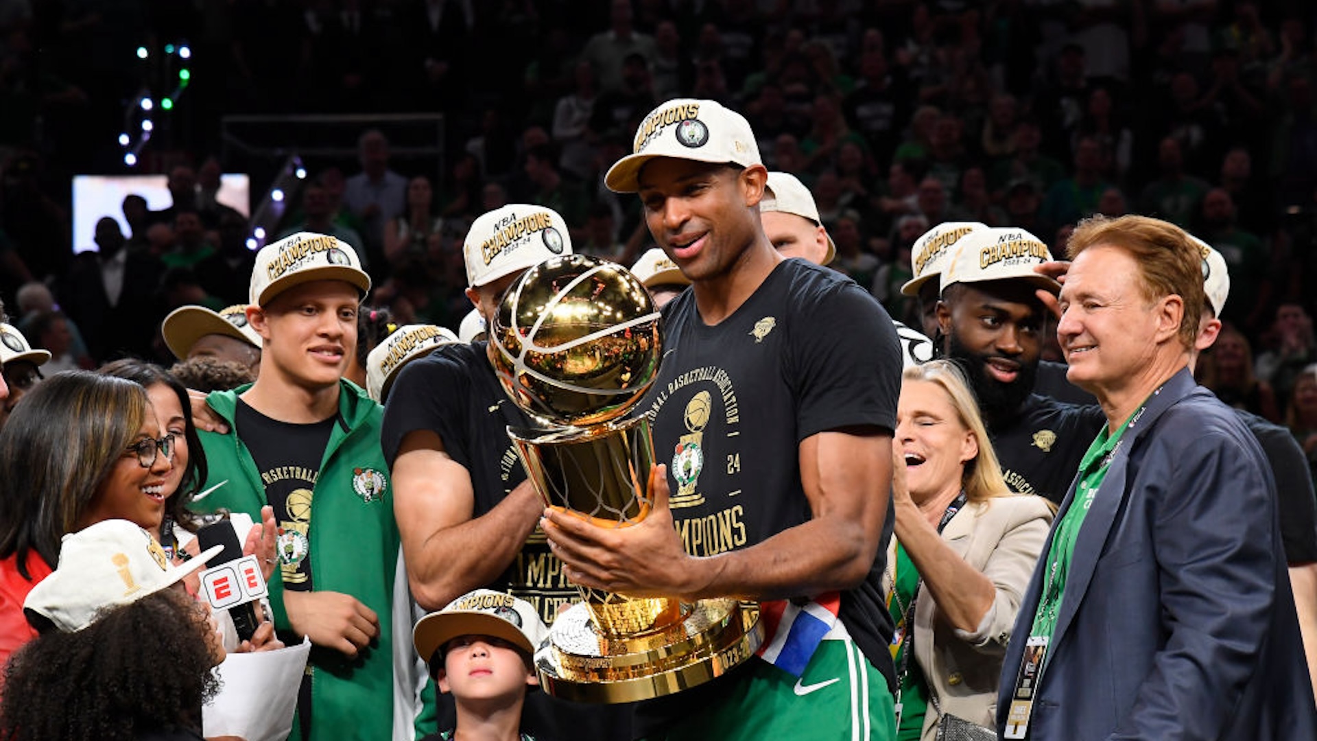 Al Horford #42 of the Boston Celtics of the Boston Celtics celebrates with the Larry O'Brien Trophy after the game against the Dallas Mavericks during Game 5 of the 2024 NBA Finals on June 17, 2024 at the TD Garden in Boston, Massachusetts.