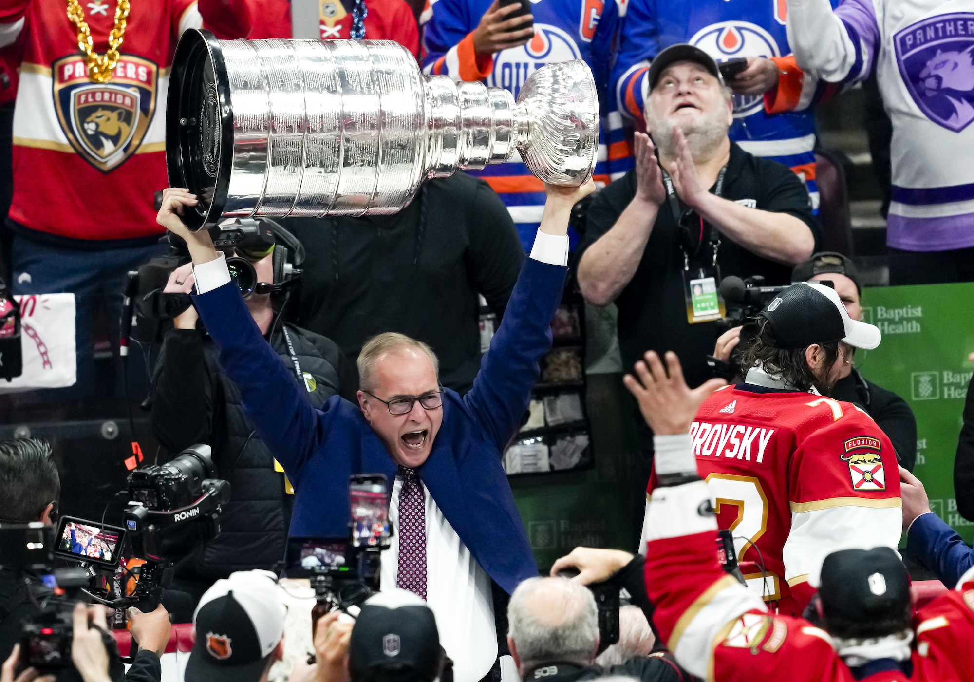 SUNRISE, FL - JUNE 24: Florida Panthers head coach Paul Maurice raises the Stanley Cup during the NHL Stanley Cup Finals, Game 7 between the Florida Panthers and Edmonton Oilers on June 24th, 2024 at Amerant Bank Arena in Sunrise, FL. (Photo by Andrew Bershaw/Icon Sportswire via Getty Images)