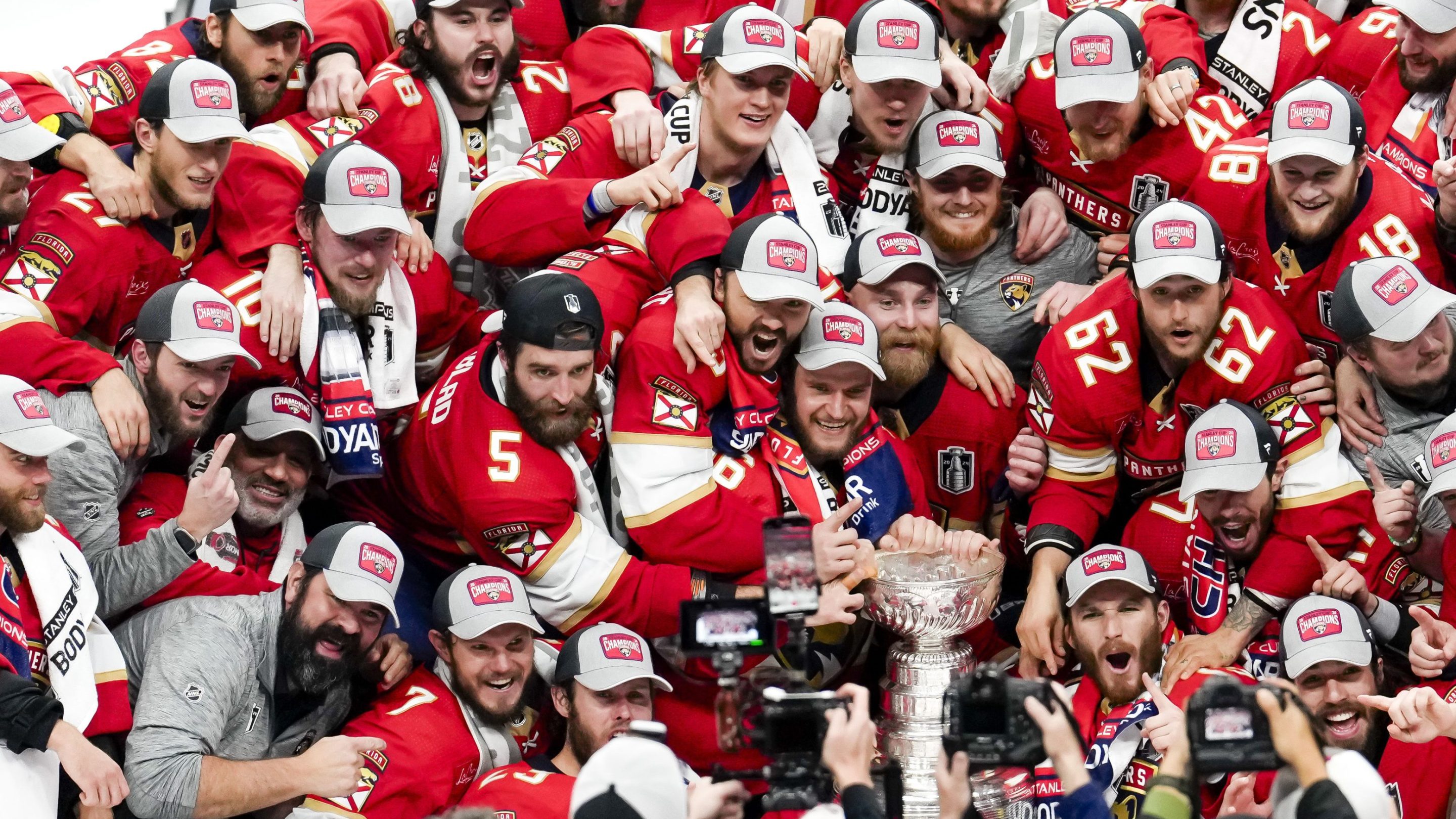 SUNRISE, FL - JUNE 24: Florida Panthers team photo with the Stanley Cup during the NHL Stanley Cup Finals, Game 7 between the Florida Panthers and Edmonton Oilers on June 24th, 2024 at Amerant Bank Arena in Sunrise, FL.