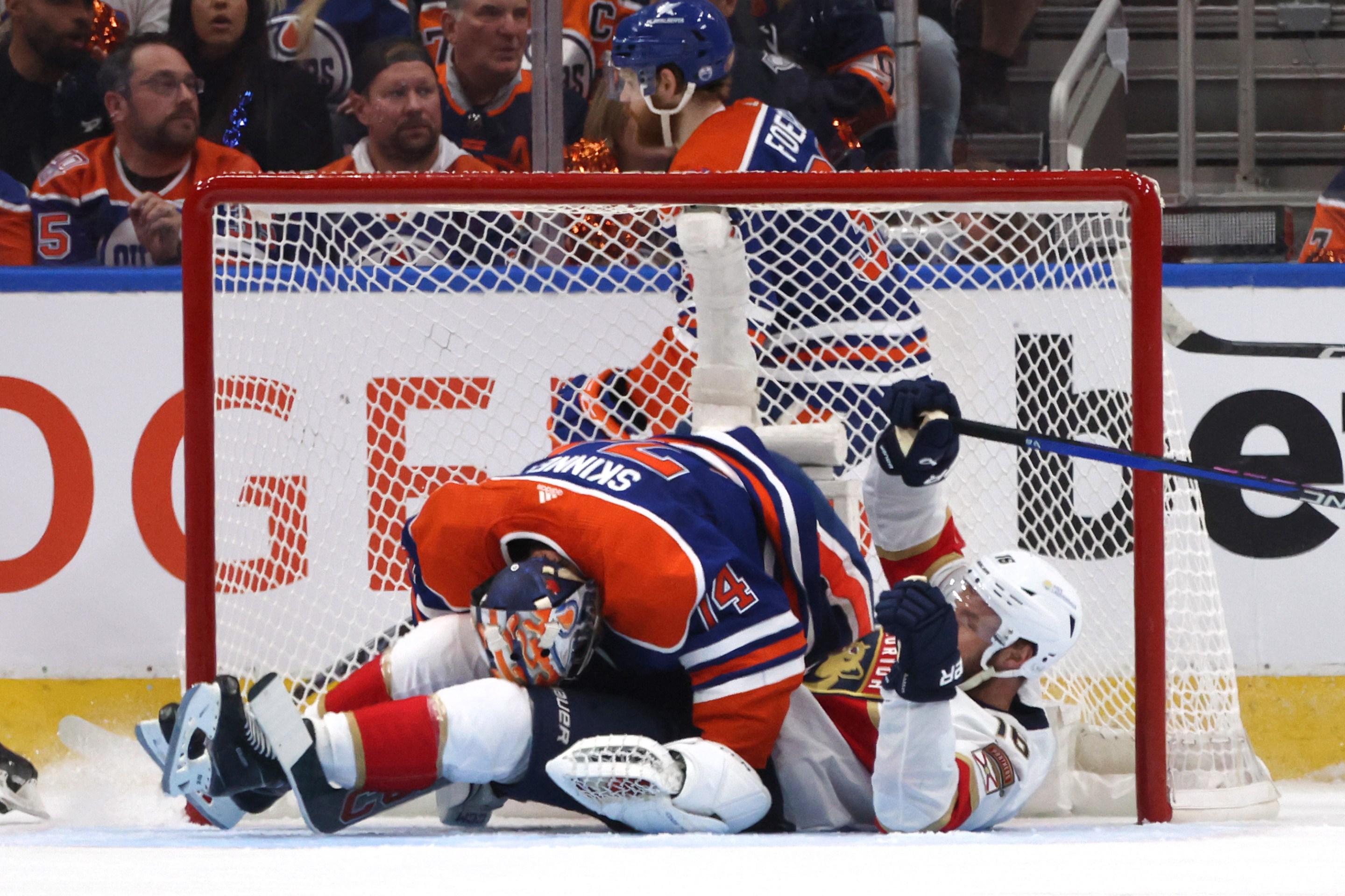 EDMONTON, ALBERTA - JUNE 21: Aleksander Barkov #16 of the Florida Panthers falls into goaltender falls into goaltender Stuart Skinner #74 of the Edmonton Oilers during the second period of Game Six of the 2024 Stanley Cup Final between Florida Panthers and the Edmonton Oilers at Rogers Place on June 21, 2024 in Edmonton, Alberta.