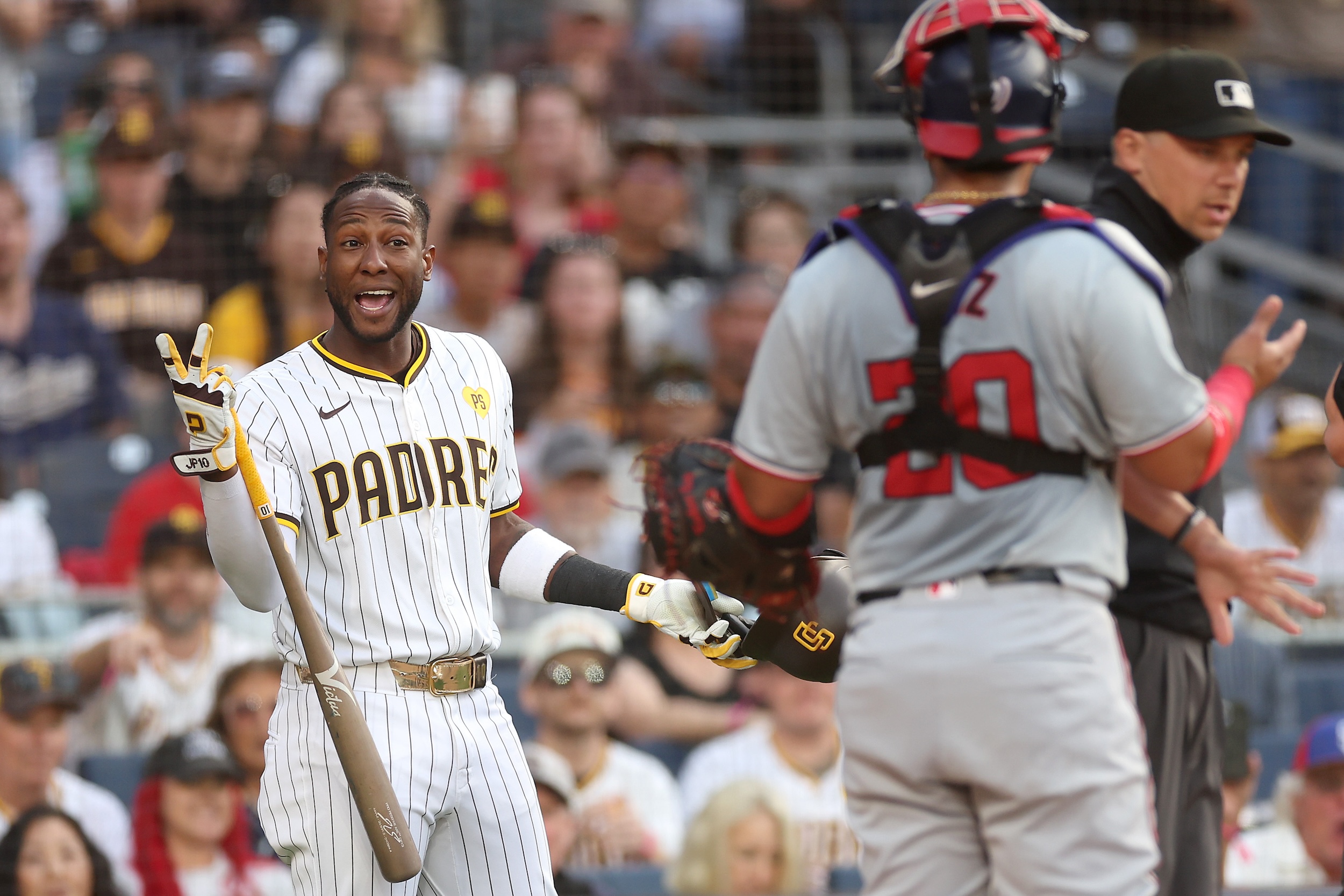 Jurickson Profar chirps at Keibert Ruiz.