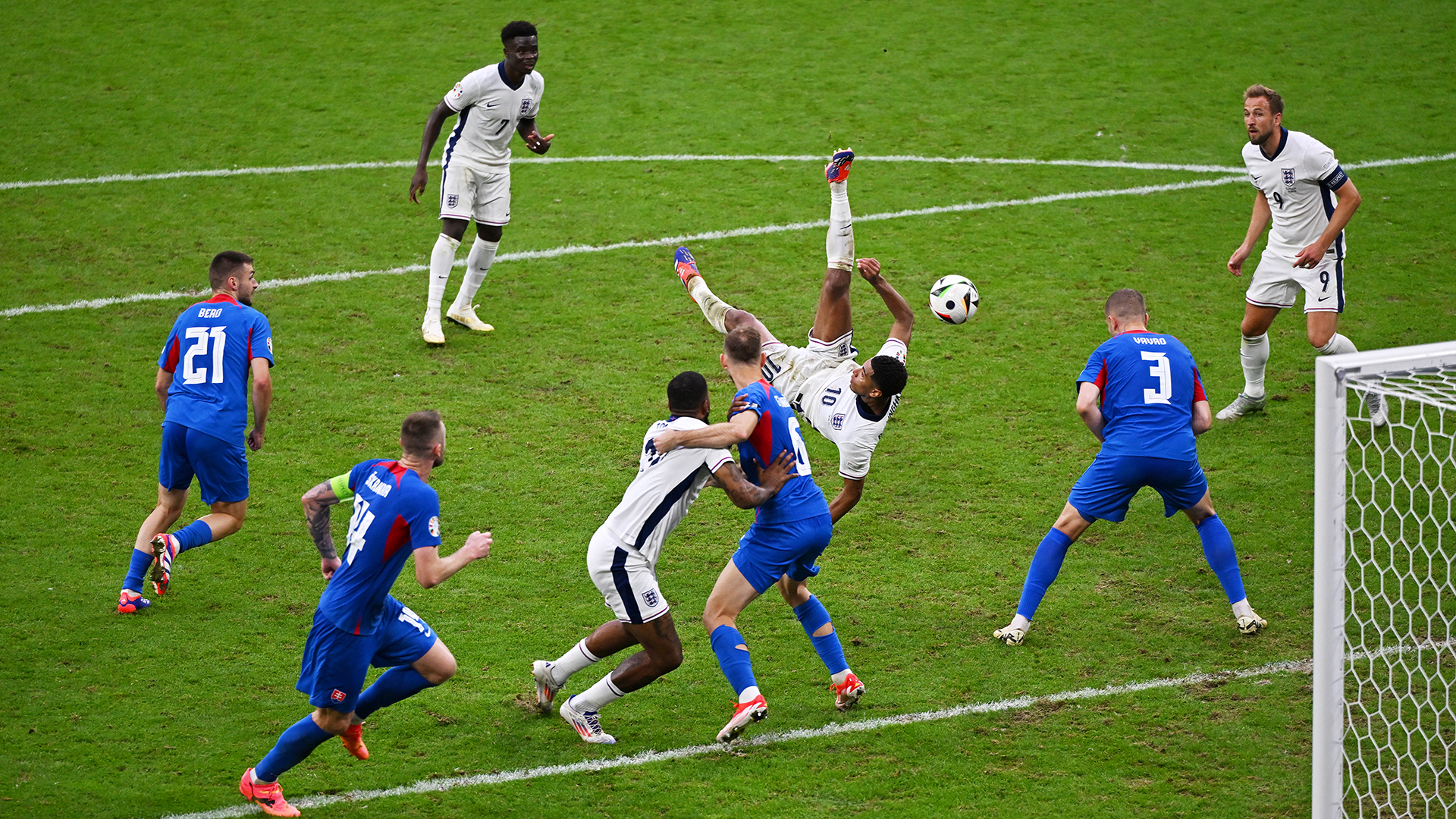 Jude Bellingham of England, scores his team's first goal with a acrobatic kick during the UEFA EURO 2024 round of 16 match between England and Slovakia at Arena AufSchalke on June 30, 2024 in Gelsenkirchen, Germany.