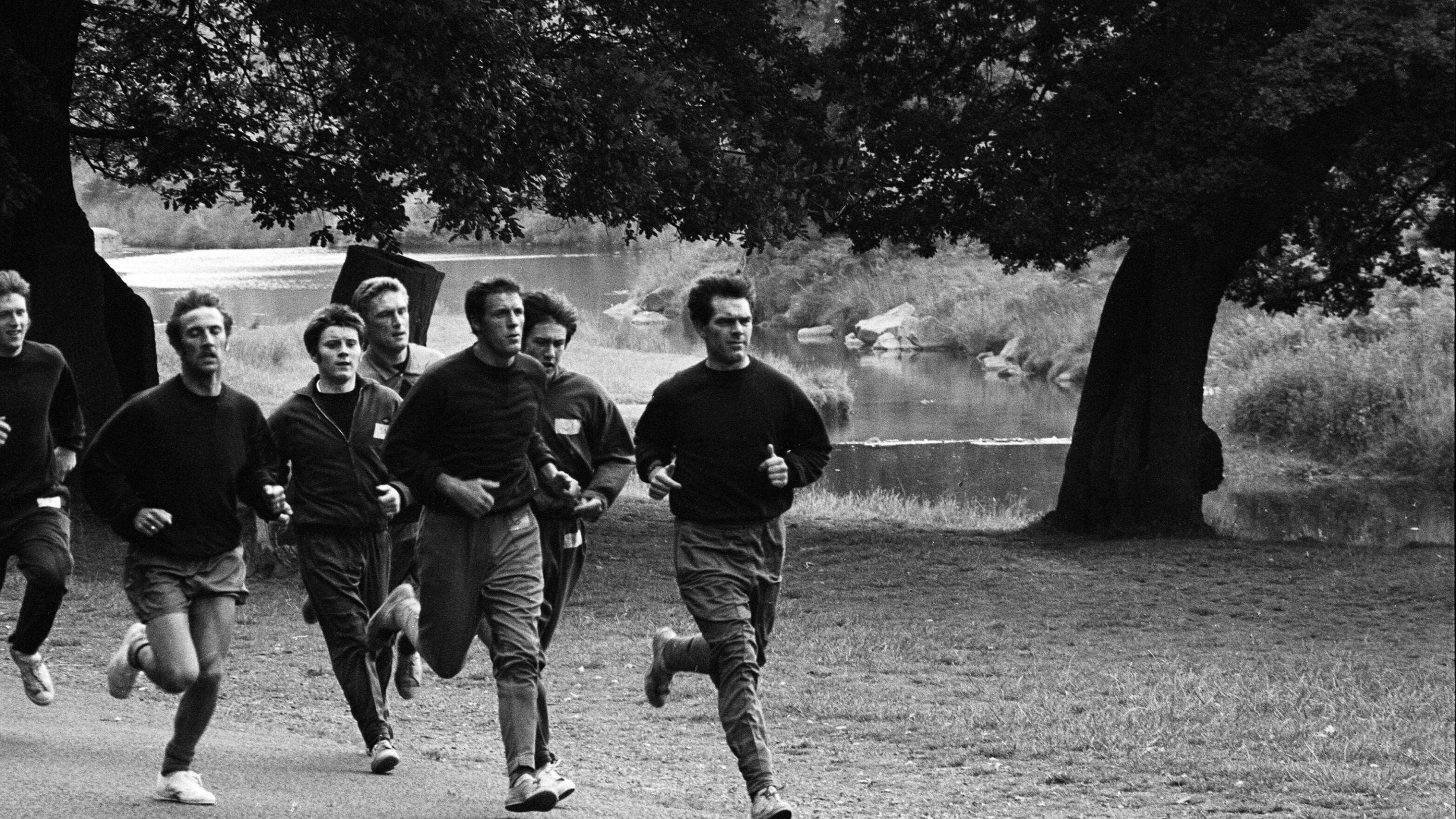 Men running in the countryside