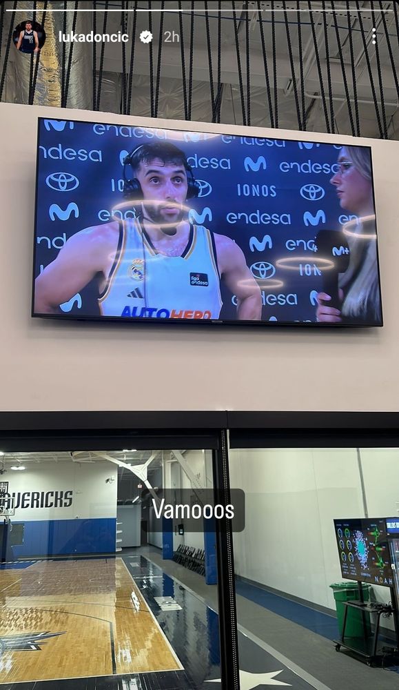 Another fucked-up Luka sports-watching rig, this time a screen seemingly hung on another screen in the Mavs' practice facility.