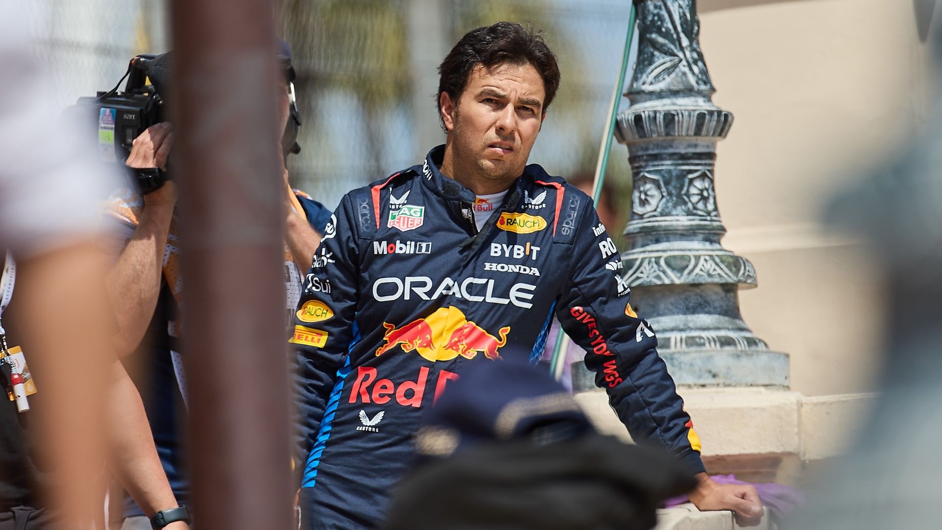 Sergio Perez of Mexico and Oracle Red Bull Racing looks on after a crash during the first lap of the race during the F1 Grand Prix of Monaco.