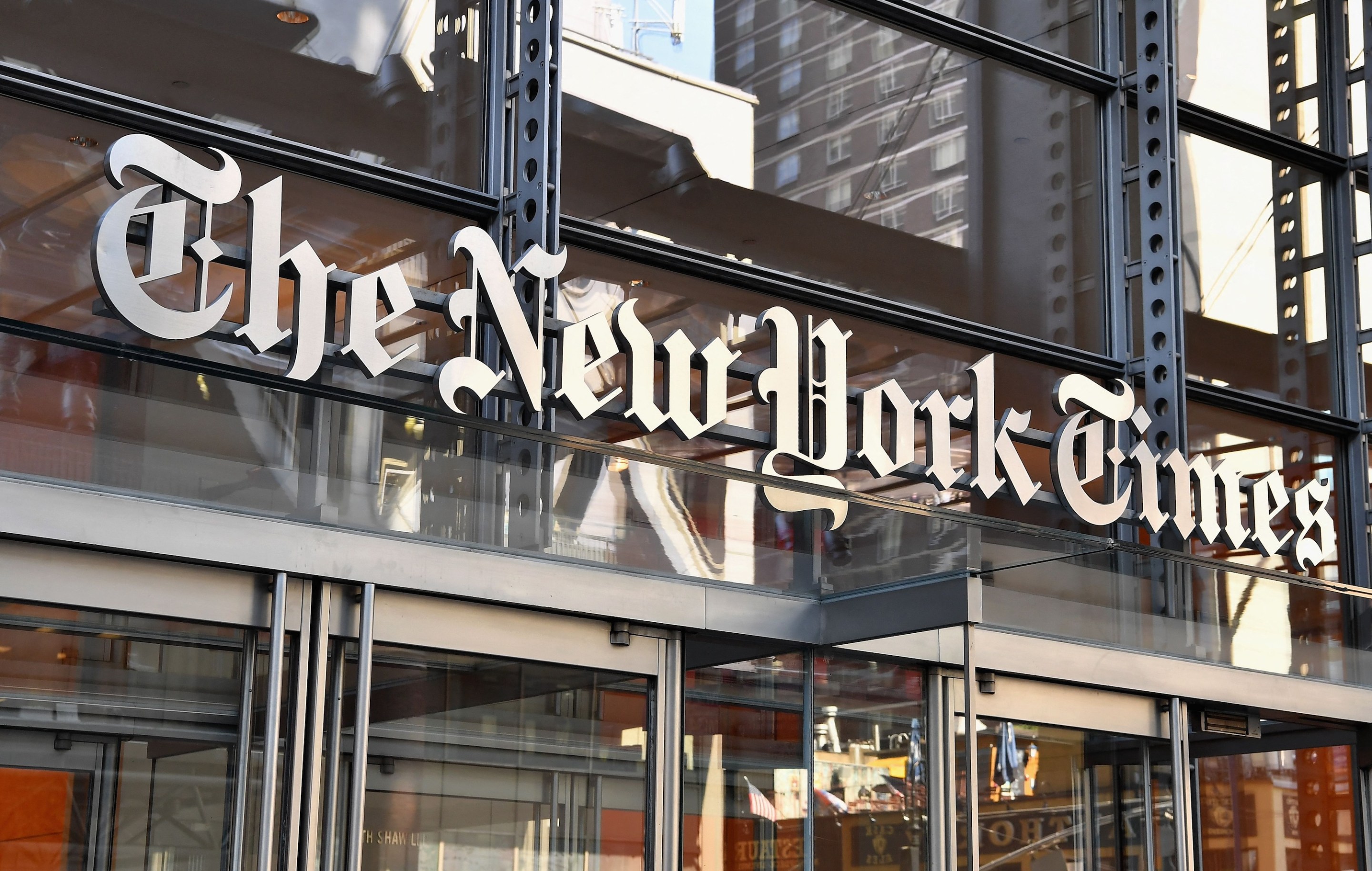 The New York Times building is seen on September 6, 2018 in New York. - A furious Donald Trump called September 5, 2018 for the unmasking of an anonymous senior official who wrote in the New York Times that top members of his administration were undermining the president to curb his "misguided impulses." Trump asked if the unsigned op-ed could be considered treasonous, assailed the newspaper for the "gutless" piece and questioned whether the senior official it was attributed to actually existed. "TREASON?" Trump posted in response to the article entitled "I Am Part of the Resistance Inside the Trump Administration," which claimed the president's own staff see him as a danger to the nation."Does the so-called 'Senior Administration Official' really exist, or is (Photo by ANGELA WEISS / AFP) (Photo by ANGELA WEISS/AFP via Getty Images)