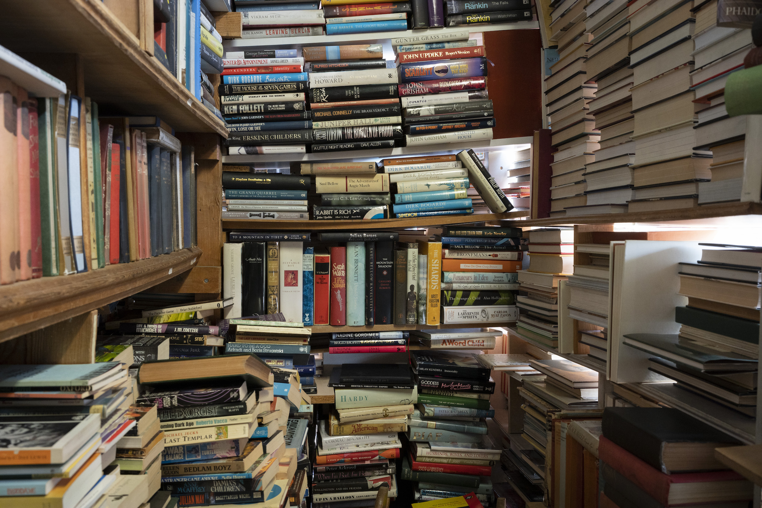 Piles of books in a bookstore in London.