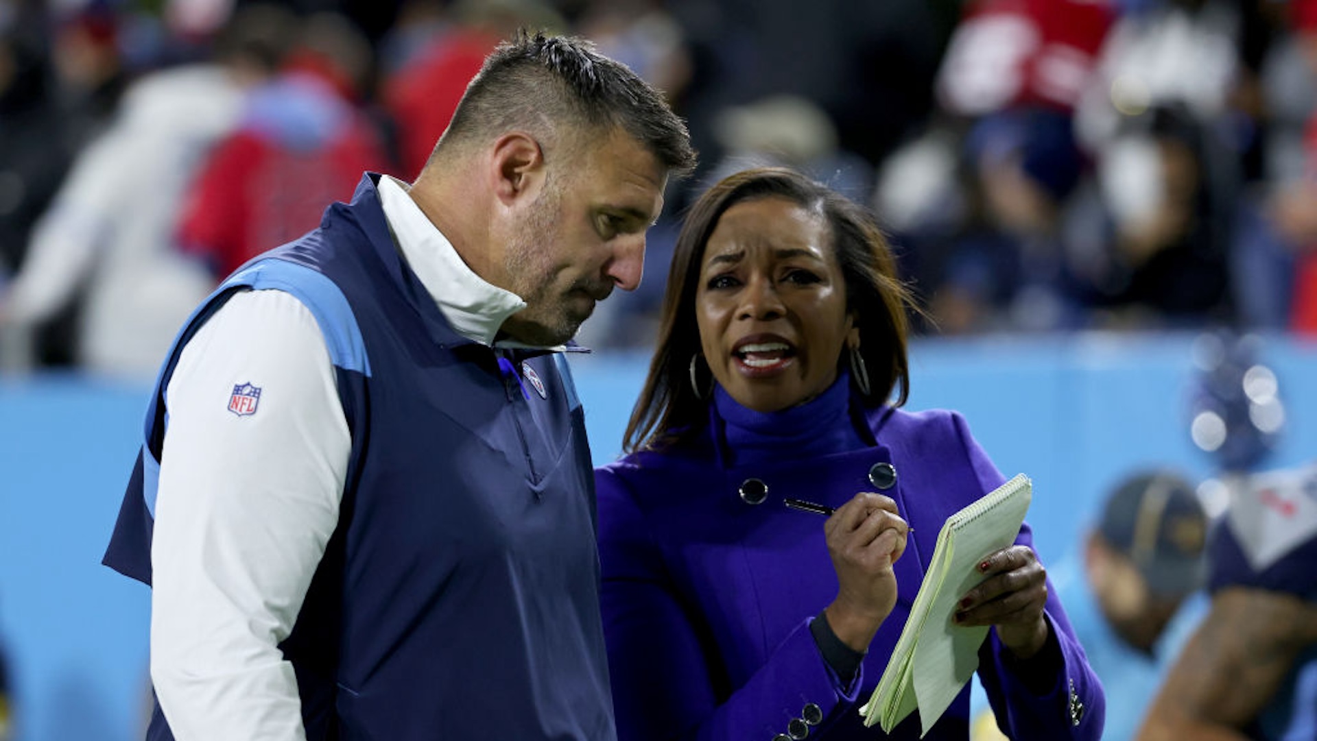 Sideline reporter Pam Oliver interviews head coach Mike Vrabel of the Tennessee Titans at halftime against the San Francisco 49ers at Nissan Stadium on December 23, 2021 in Nashville, Tennessee.