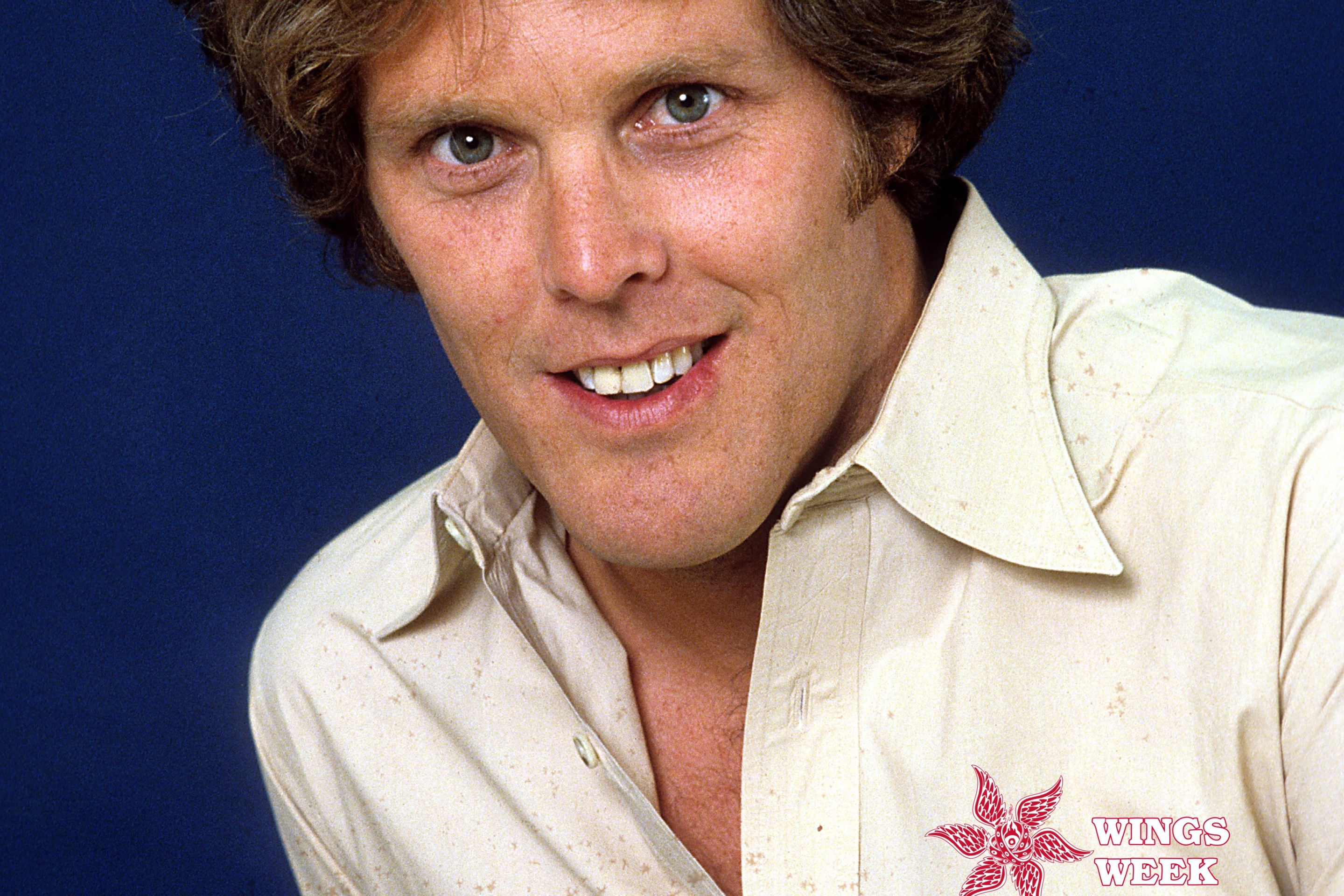 Actor Wings Hauser poses for a portrait in circa 1980. The Defector Wings Week logo is on his shirt.