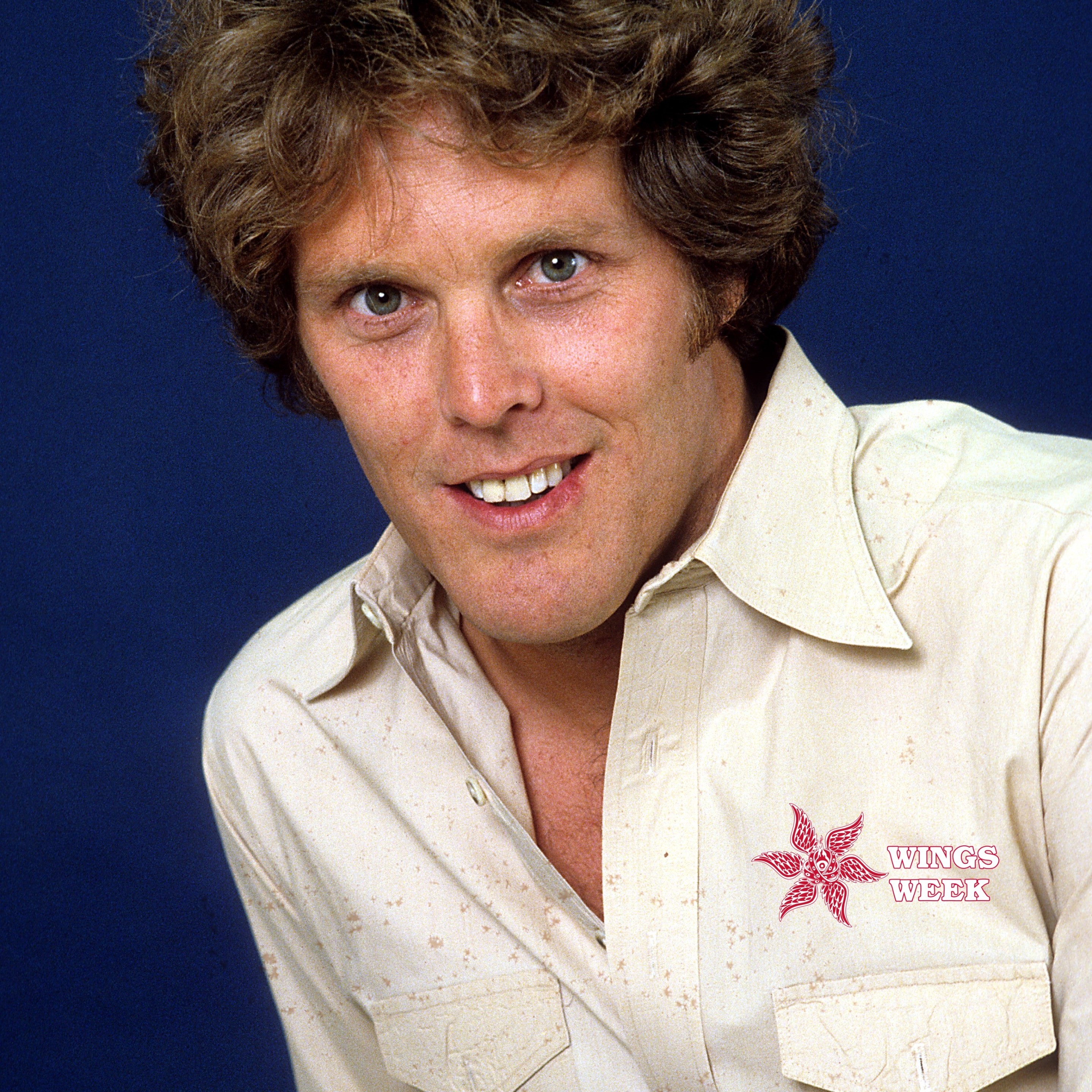 Actor Wings Hauser poses for a portrait in circa 1980. The Defector Wings Week logo is on his shirt.