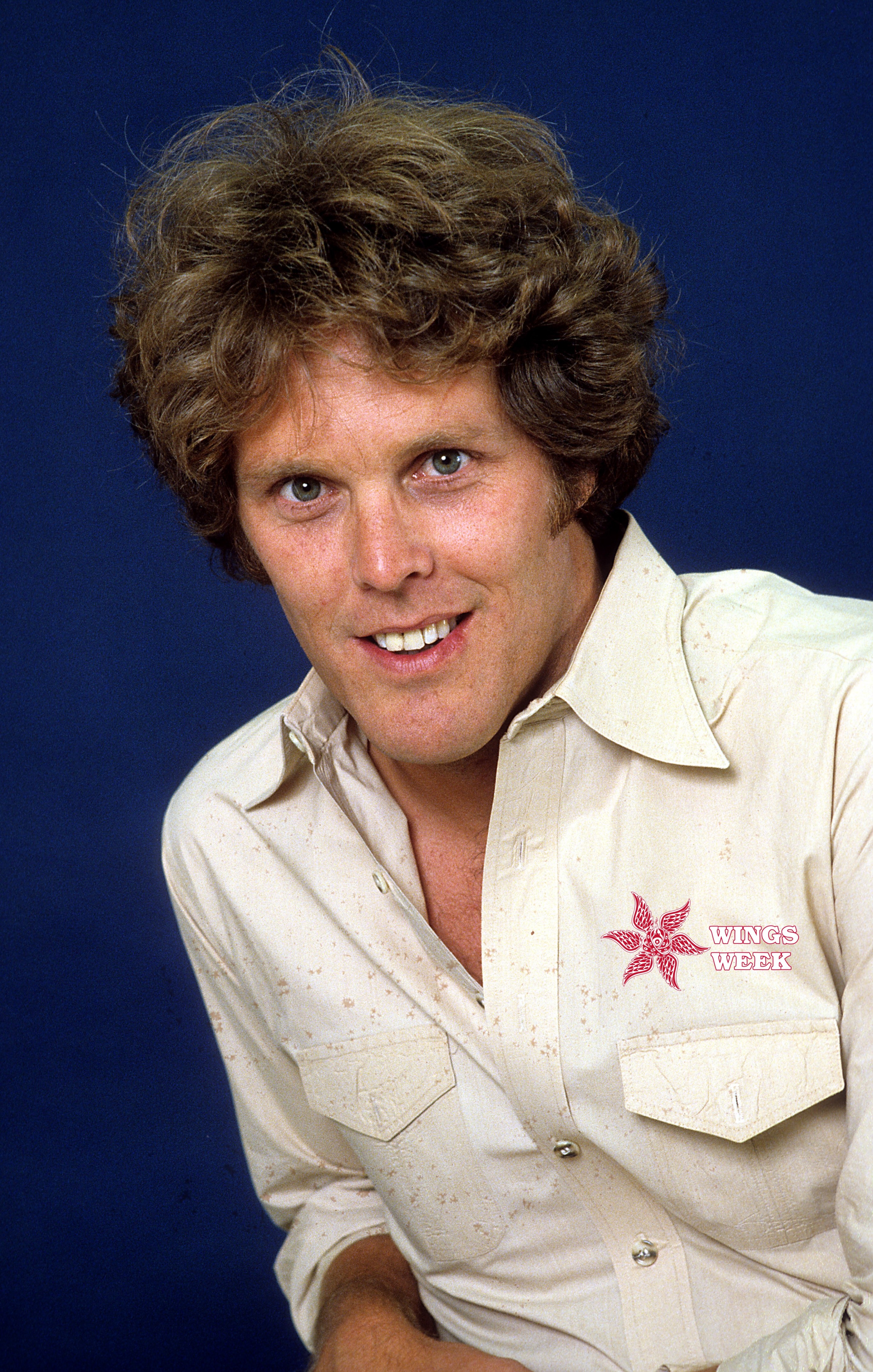 Actor Wings Hauser poses for a portrait in circa 1980. The Defector Wings Week logo is on his shirt.