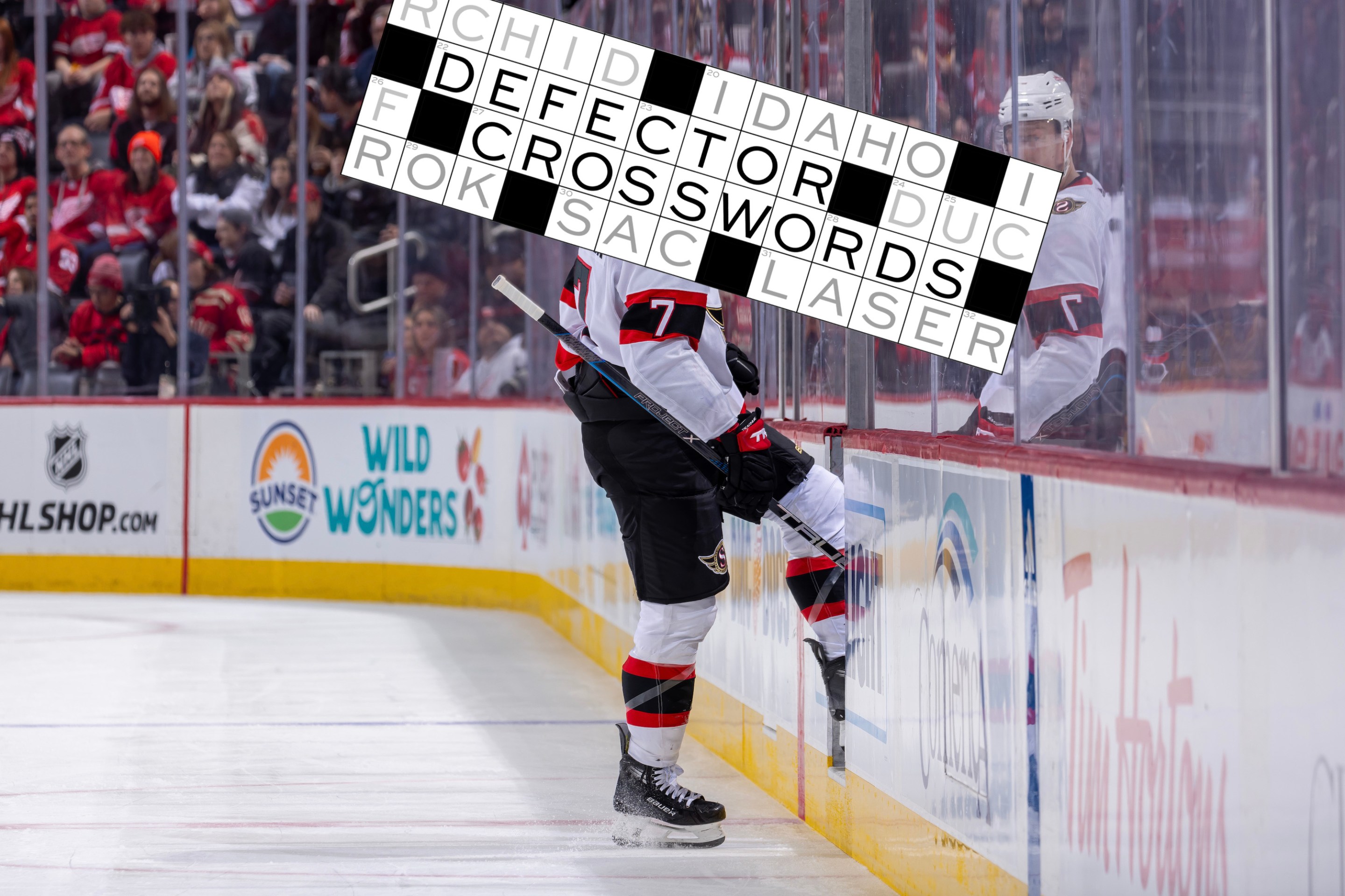 Brady Tkachuk #7 of the Senators steps into the steps into the penalty box during the second period of the game against the Detroit Red Wings at Little Caesars Arena on January 31, 2024 in Detroit, Michigan.