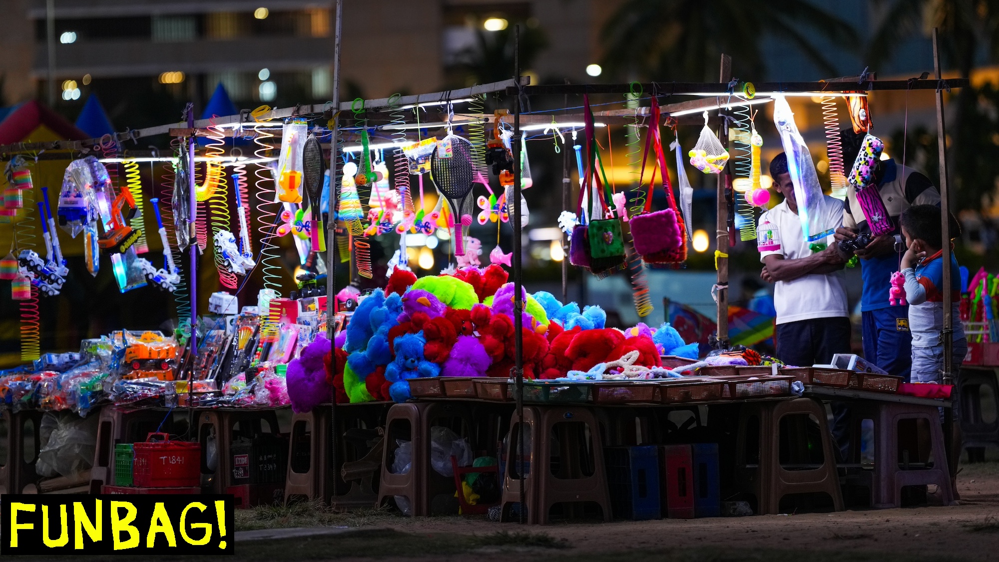 A toy vendor is selling toys in Colombo, Sri Lanka, on February 28, 2024. (Photo by Thilina Kaluthotage/NurPhoto)