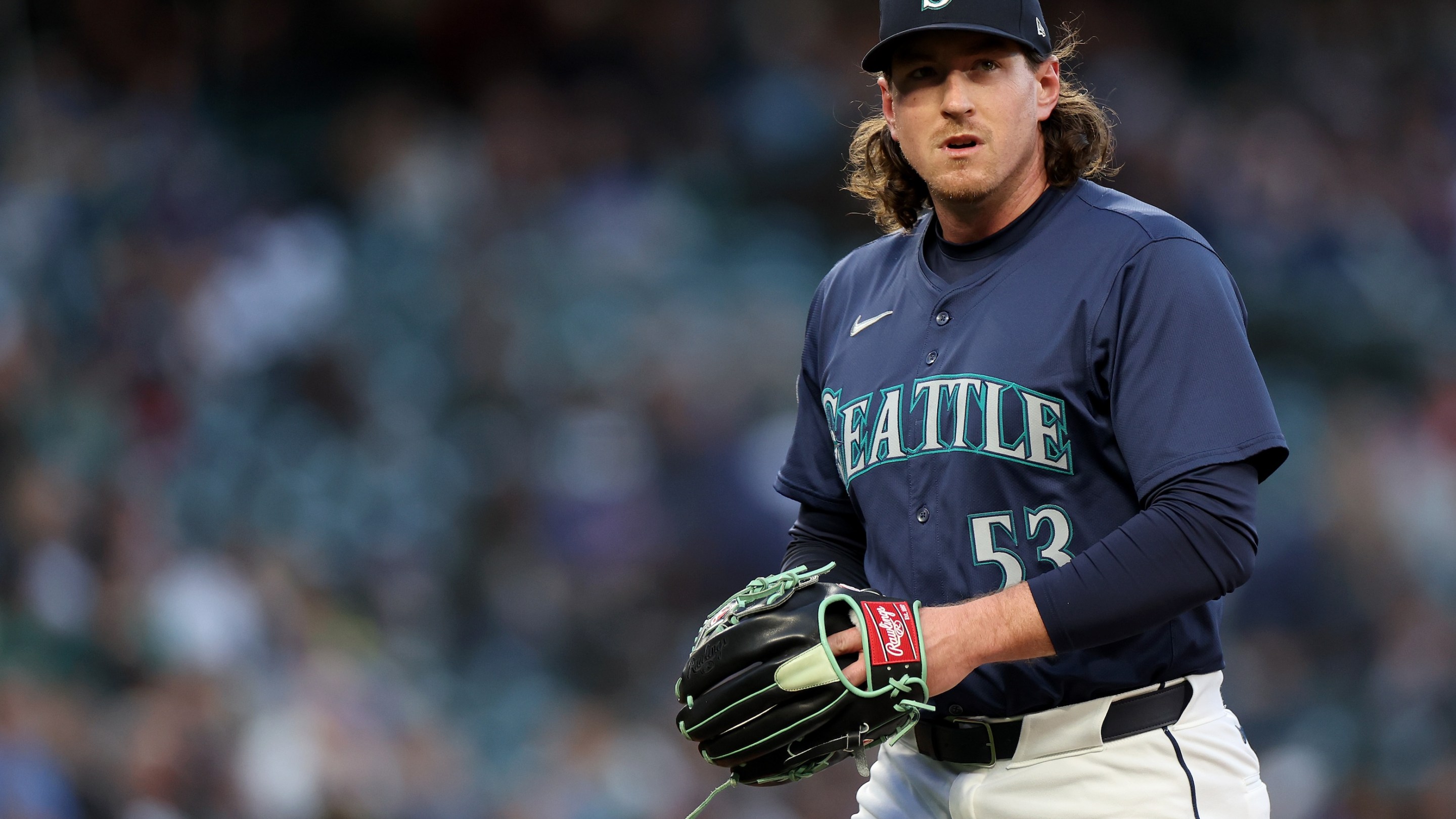 Mike Baumann #53 of the Seattle Mariners looks on during the game against the Chicago White Sox at T-Mobile Park on June 12, 2024 in Seattle.