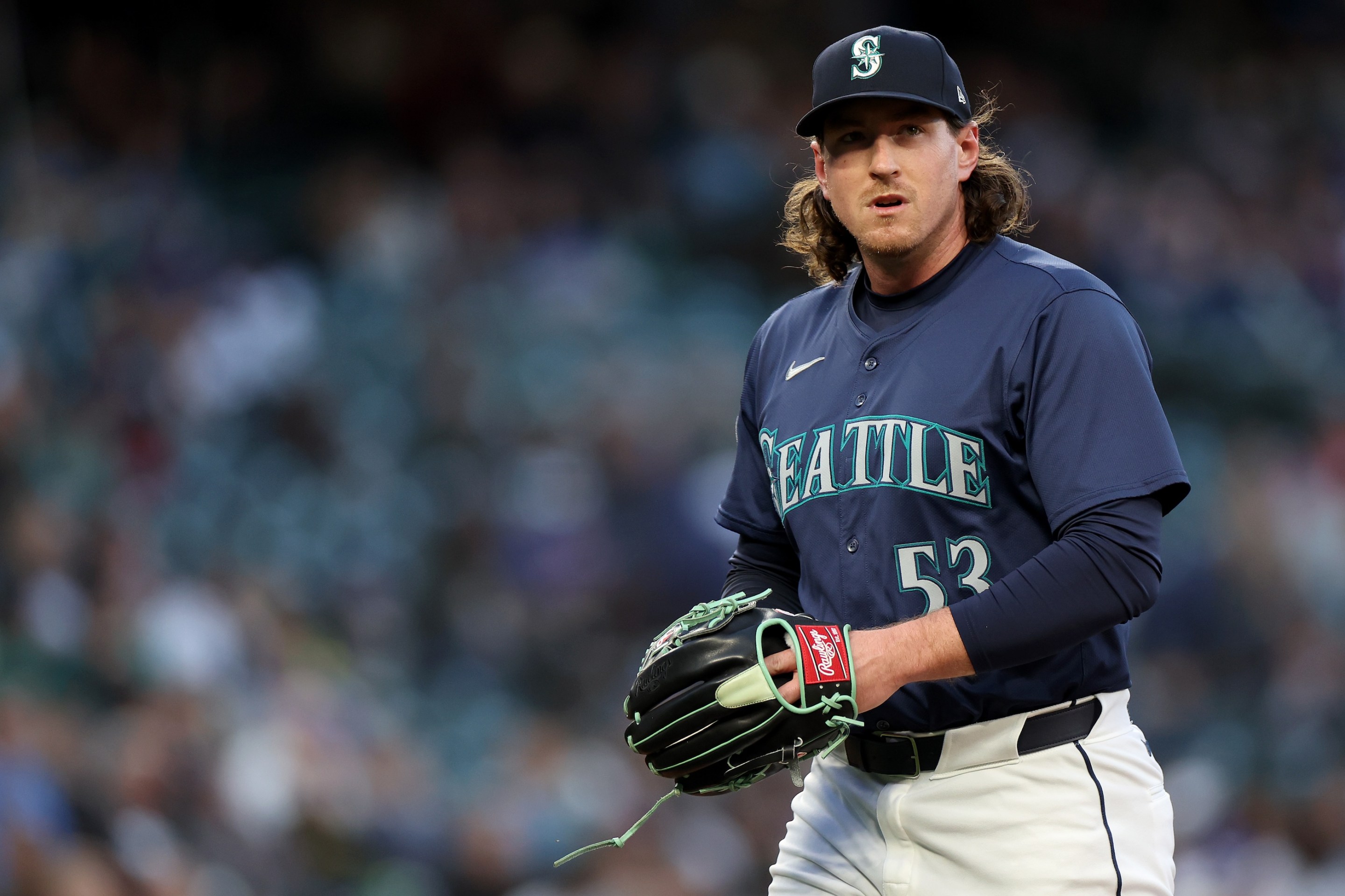 Mike Baumann #53 of the Seattle Mariners looks on during the game against the Chicago White Sox at T-Mobile Park on June 12, 2024 in Seattle.