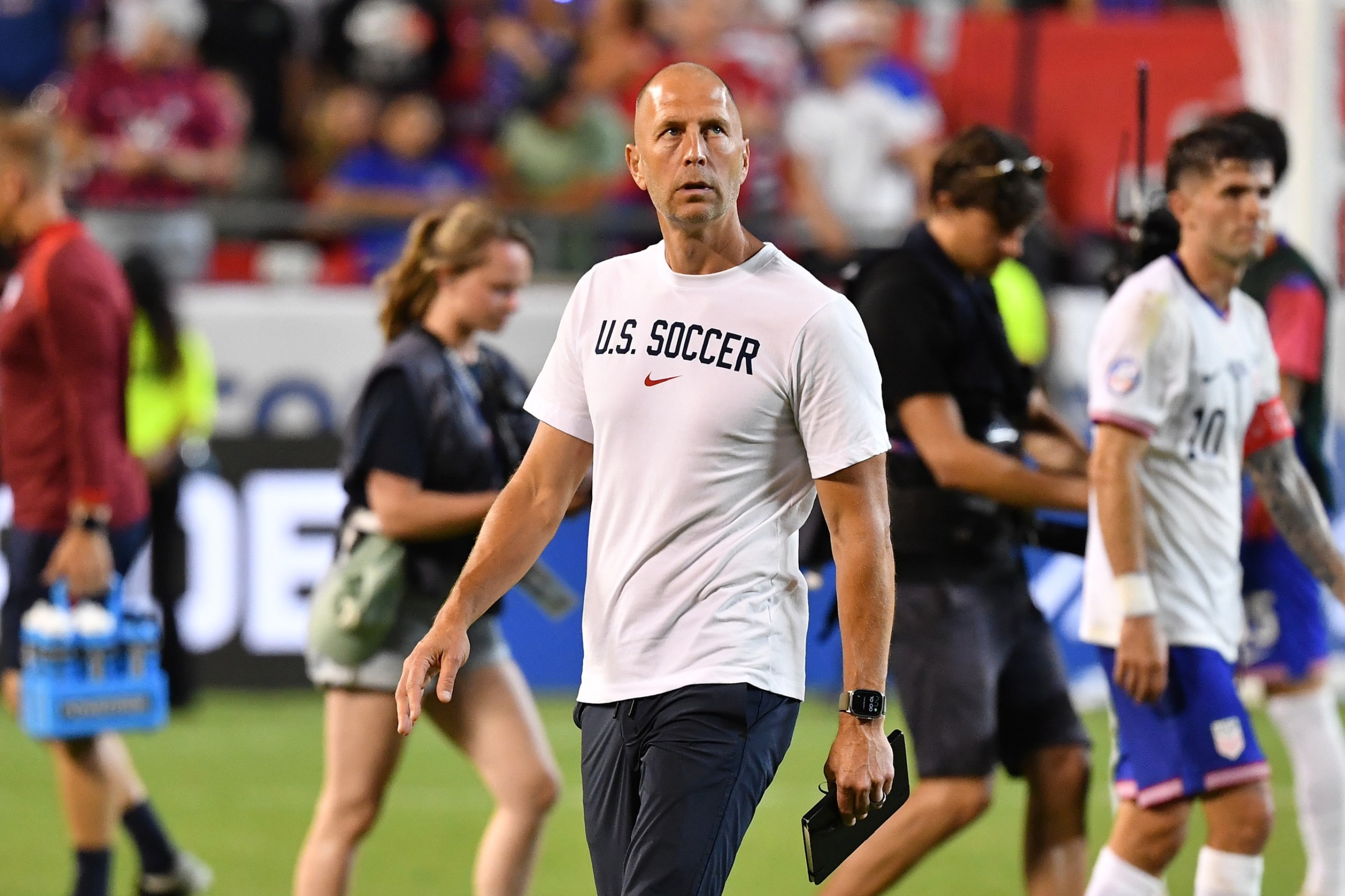 KANSAS CITY, MISSOURI - JULY 1: United States Head Coach Gregg Berhalter walks across the field at the end of the CONMEBOL Copa America group C match between the United States and Uruguay at GEHA Field at Arrowhead Stadium on July 1, 2024 in Kansas City, Missouri. (Photo by Bill Barrett/ISI Photos/USSF/Getty Images for USSF)KANSAS CITY, MISSOURI - JULY 1: during the CONMEBOL Copa America group C match between the United States and Uruguay at GEHA Field at Arrowhead Stadium on July 1, 2024 in Kansas City, Missouri. (Photo by Bill Barrett/ISI Photos/USSF/Getty Images for USSF)