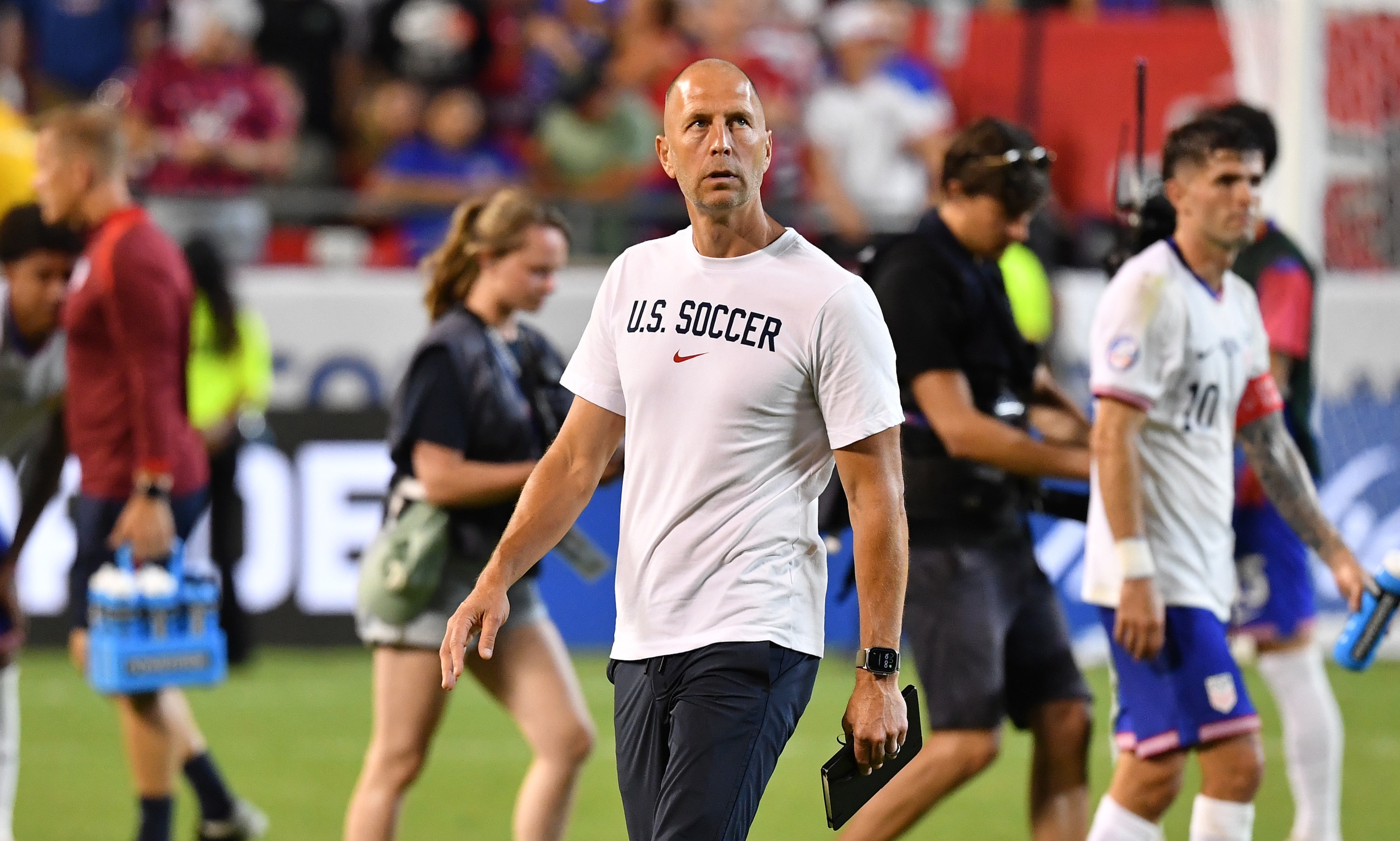 KANSAS CITY, MISSOURI - JULY 1: United States Head Coach Gregg Berhalter walks across the field at the end of the CONMEBOL Copa America group C match between the United States and Uruguay at GEHA Field at Arrowhead Stadium on July 1, 2024 in Kansas City, Missouri. (Photo by Bill Barrett/ISI Photos/USSF/Getty Images for USSF)KANSAS CITY, MISSOURI - JULY 1: during the CONMEBOL Copa America group C match between the United States and Uruguay at GEHA Field at Arrowhead Stadium on July 1, 2024 in Kansas City, Missouri. (Photo by Bill Barrett/ISI Photos/USSF/Getty Images for USSF)