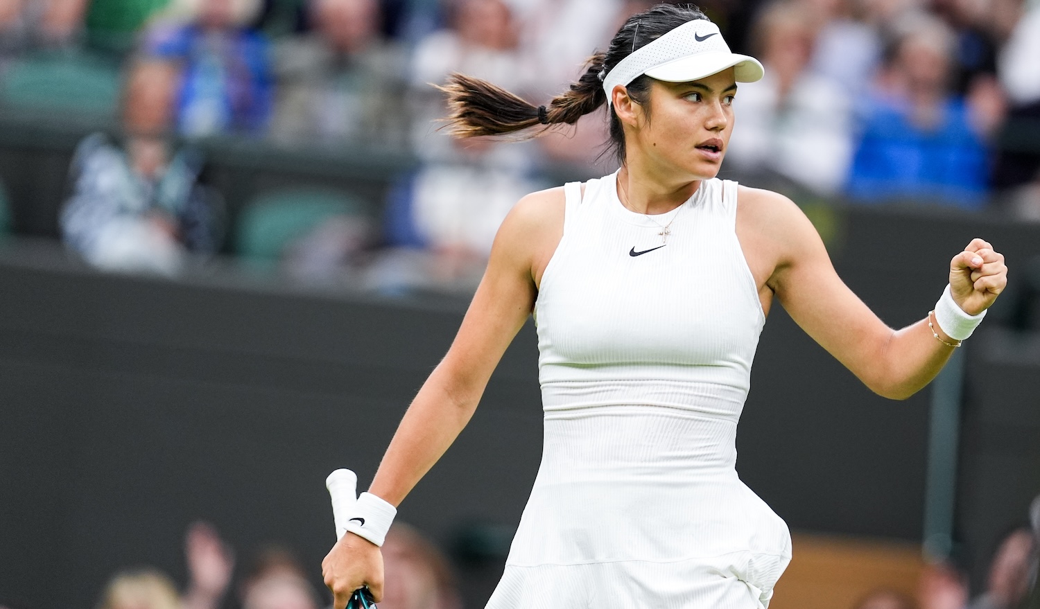 LONDON, ENGLAND - JULY 03: Emma Raducanu of United Kingdom reacts in the Women's Singles Second Round match against Elise Mertens of Belgium during day three of The Championships Wimbledon 2024 at All England Lawn Tennis and Croquet Club on July 03, 2024 in London, England.shi (Photo by Shi Tang/Getty Images)