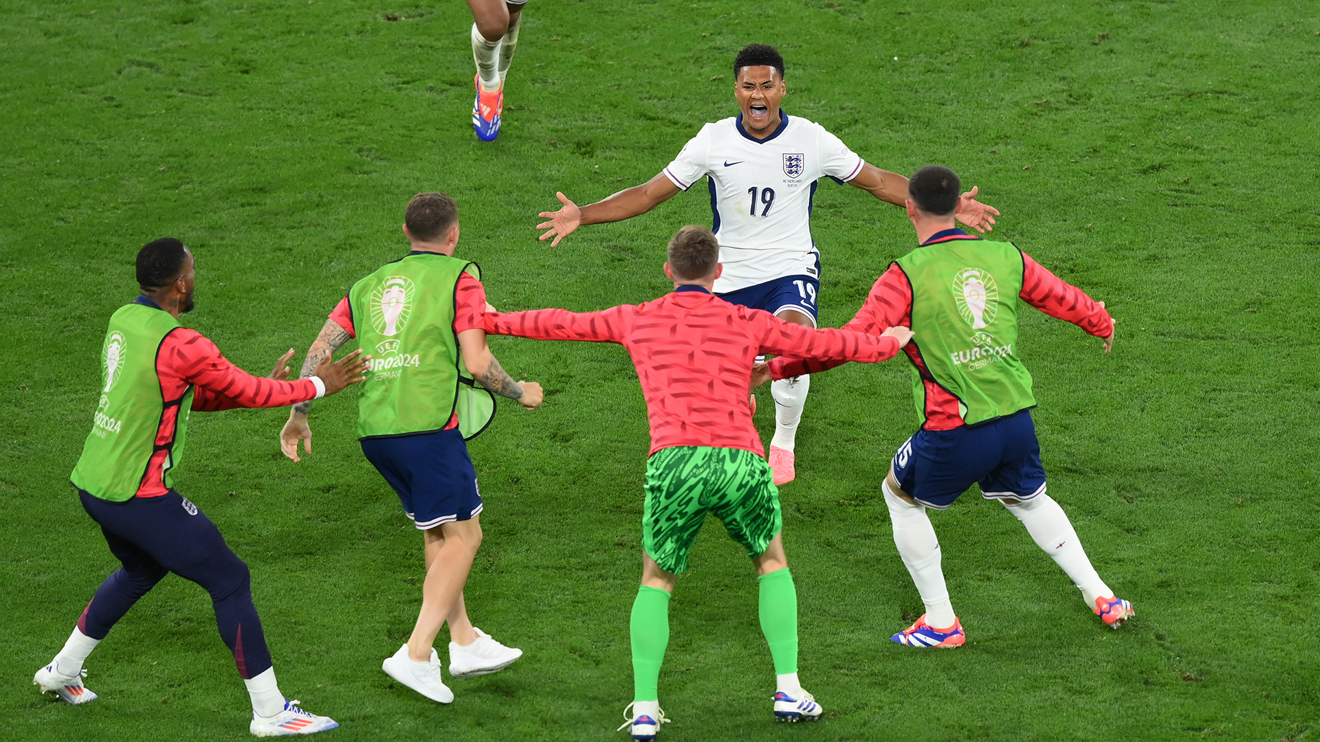 Ollie Watkins of England celebrates scoring his team's second goal with teammates from the substitutes bench during the UEFA EURO 2024 semi-final match between Netherlands and England at Football Stadium Dortmund on July 10, 2024 in Dortmund, Germany.