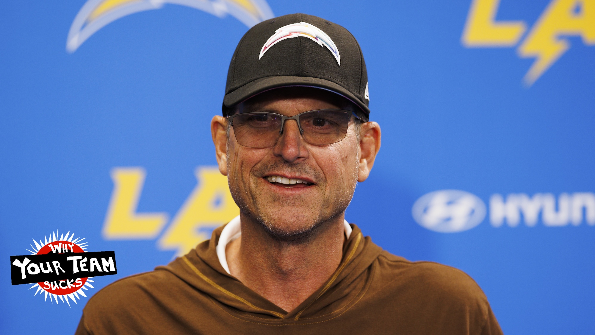 COSTA MESA, CALIFORNIA - JUNE 13: Jim Harbaugh of the Los Angeles Chargers at the podium before an NFL football practice at Hoag Performance Center on June 13, 2024 in Costa Mesa, California. (Photo by Ric Tapia/Getty Images)