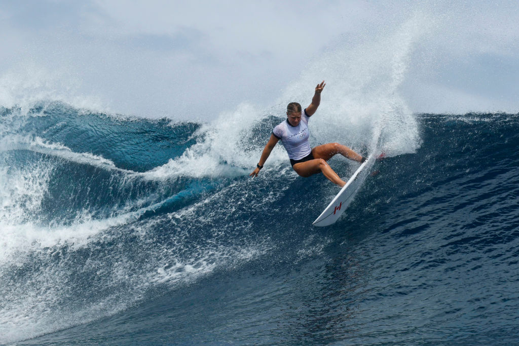 Canada's Sanoa Dempfle-Olin takes part in a surfing training session in Teahupo'o,