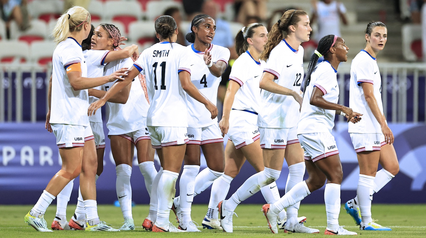 US' forward #05 Trinity Rodman (3L) celebrates scoring the opening goal in the women's group A football match between the USA and Zambia during the Paris 2024 Olympic Games at the Nice Stadium in Nice, on July 25, 2024.