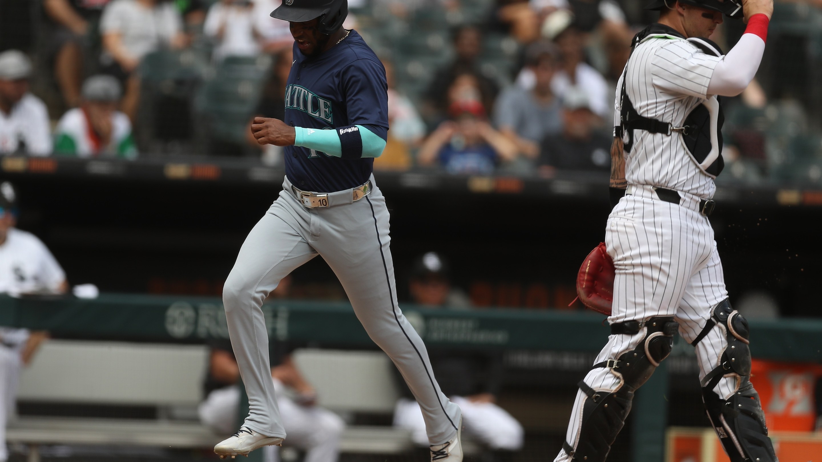 CHICAGO, IL - JULY 28: Victor Robles #10 of the Seattle Mariners scores during the fourth inning against the Chicago White Sox on July 28, 2024 at Guaranteed Rate Field in Chicago, Illinois.