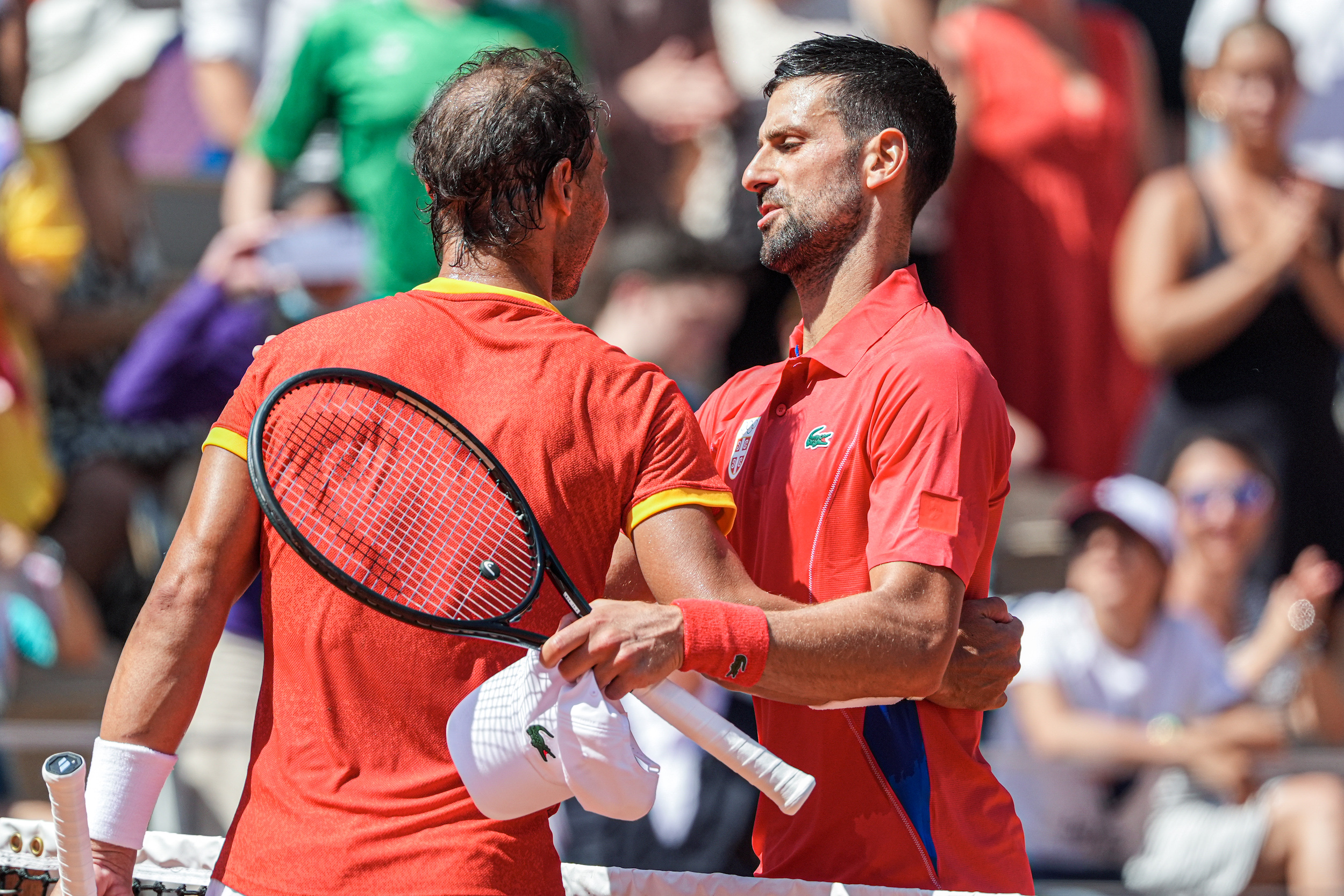 PARIS, FRANCE - JULY 29: Rafael Nadal of Spain, Novak Djokovic of Serbia competing in the Men's Singles Second Round during Day 3 of Tennis - Olympic Games Paris 2024 at Roland Garros on July 29, 2024 in Paris, France. (Photo by Joris Verwijst/BSR Agency/Getty Images)