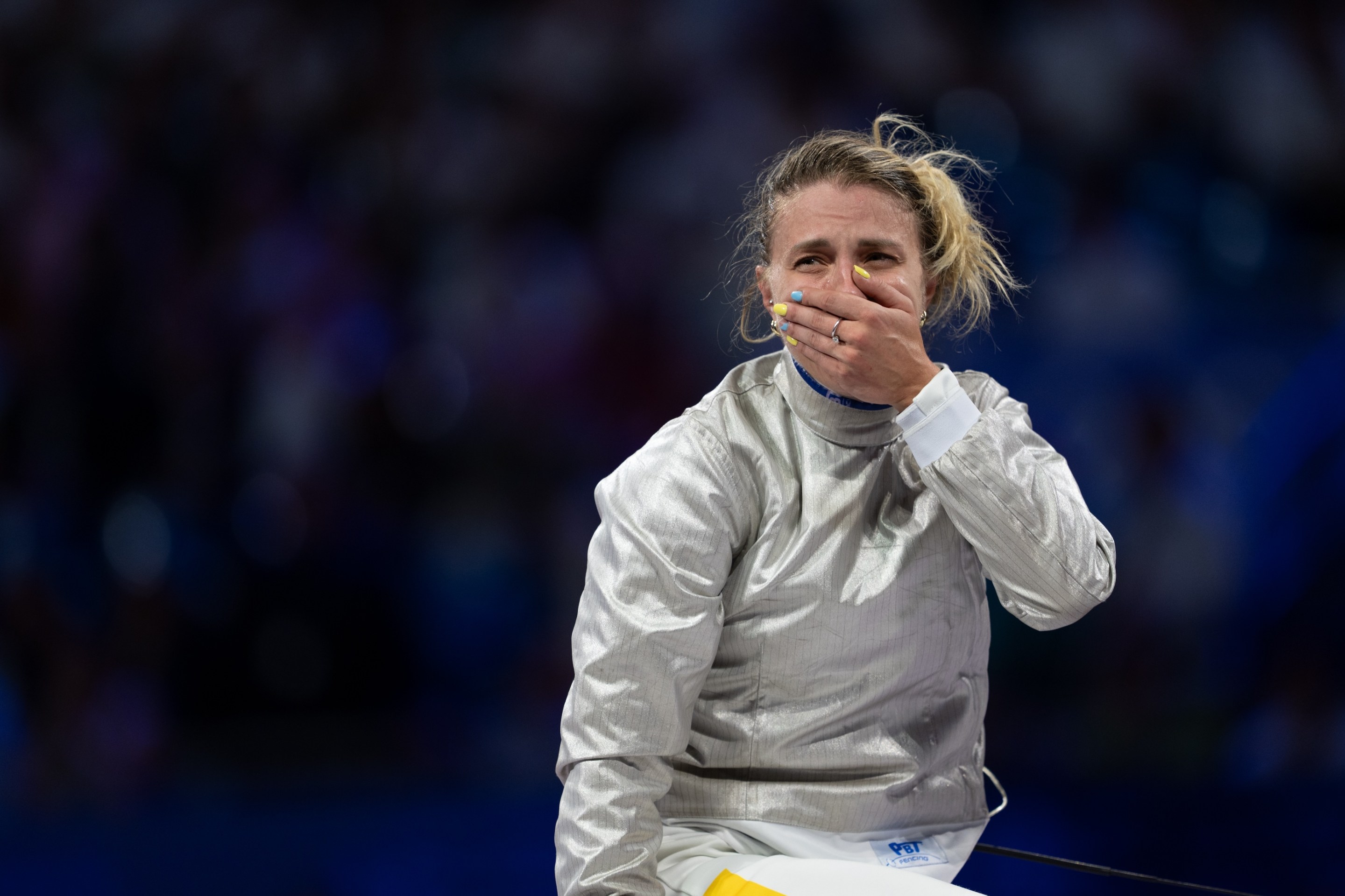 Olga Kharlan of Ukraine celebrates as she wins bronze medal after competing against Choi Se-bin (not seen) of South Korea in the Fencing Women's Foil Individual on day three of the Olympic Games Paris 2024 at Grand Palais in Paris, France on July 29, 2024.