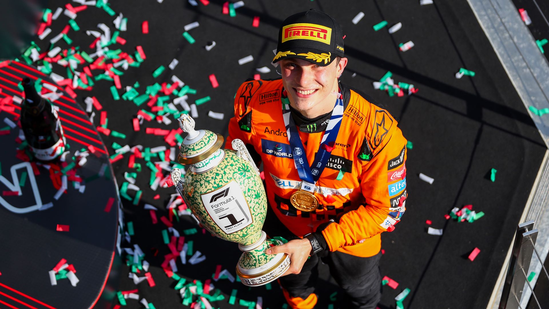 Oscar Piastri of McLaren and Australia with the winners trophy after finishing in first position during the F1 Grand Prix of Hungary.