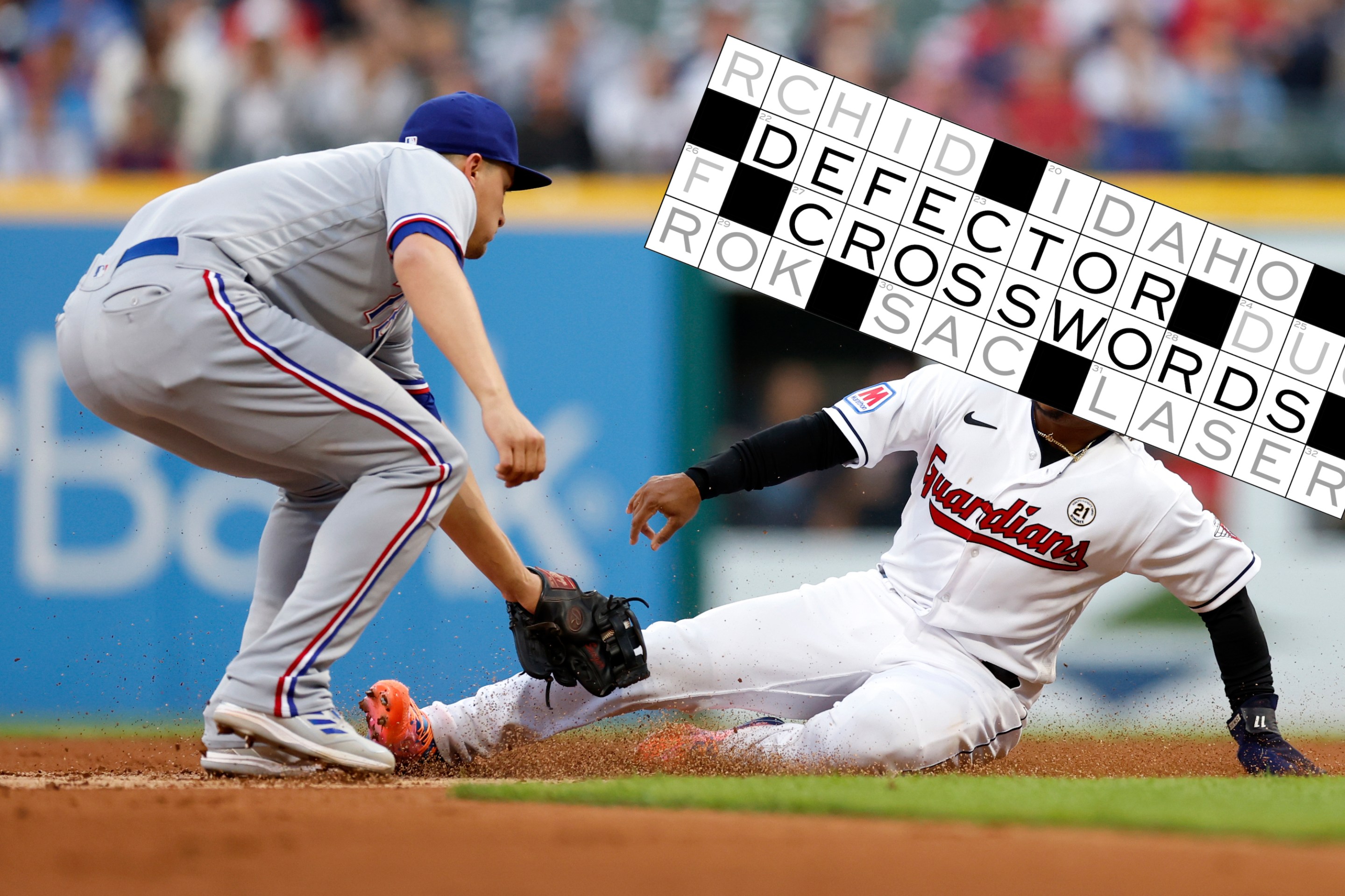 Corey Seager tags out Jose Ramirez as he attempts to steal second base