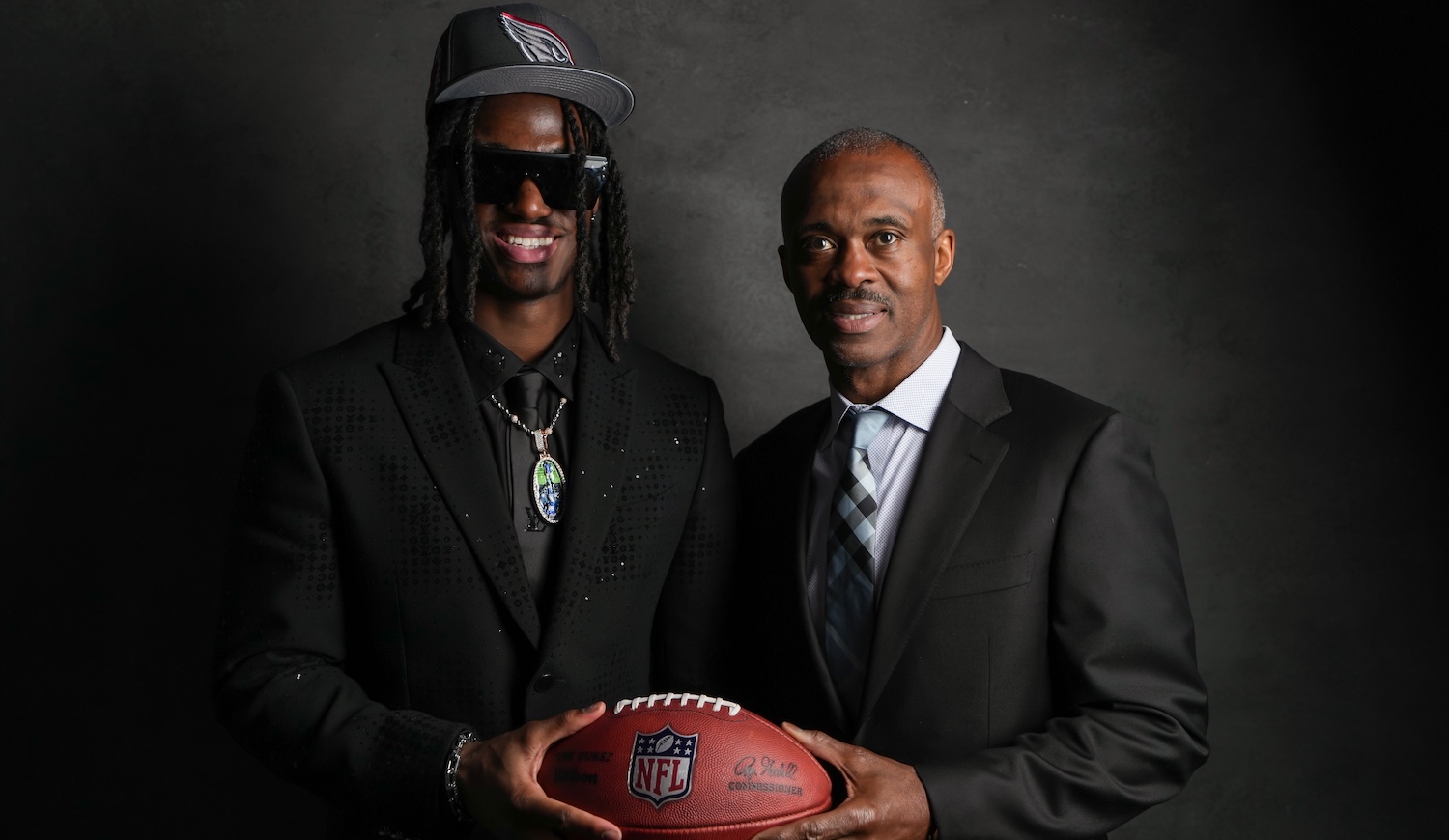 DETROIT,MI - APRIL 25: Wide receiver Marvin Harrison Jr. poses for portraits with his father, and former Indianapolis Colts wide receiver Marvin Harrison after being selected fourth overall in the first round by the Arizona Cardinals during the 2024 NFL draft on April 25, 2024 in Detroit Michigan. (Photo by Todd Rosenberg/Getty Images)