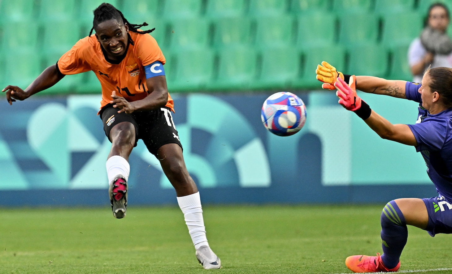 Zambia's forward #11 Barbra Banda shoots to score the first goal for Zambia in the women's group B football match between Zambia and Germany during the Paris 2024 Olympic Games at the Geoffroy-Guichard Stadium in Saint-Etienne on July 31, 2024.