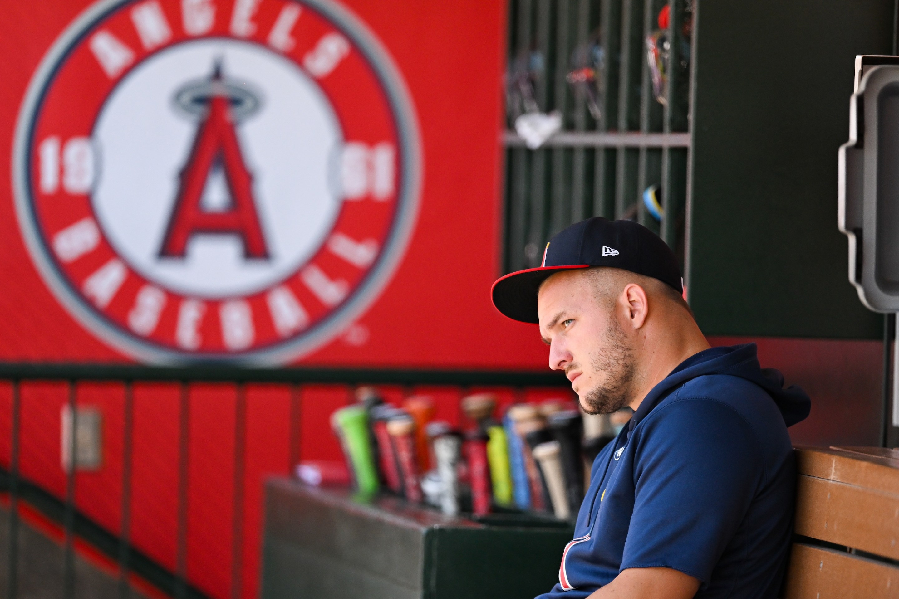 ANAHEIM, CALIFORNIA - JULY 28: Mike Trout #27 of the Los Angeles Angels looks on in the dugout during the regular season game against the Oakland Athletics at Angel Stadium of Anaheim on July 28, 2024 in Anaheim, California. (Photo by Gene Wang/Getty Images)