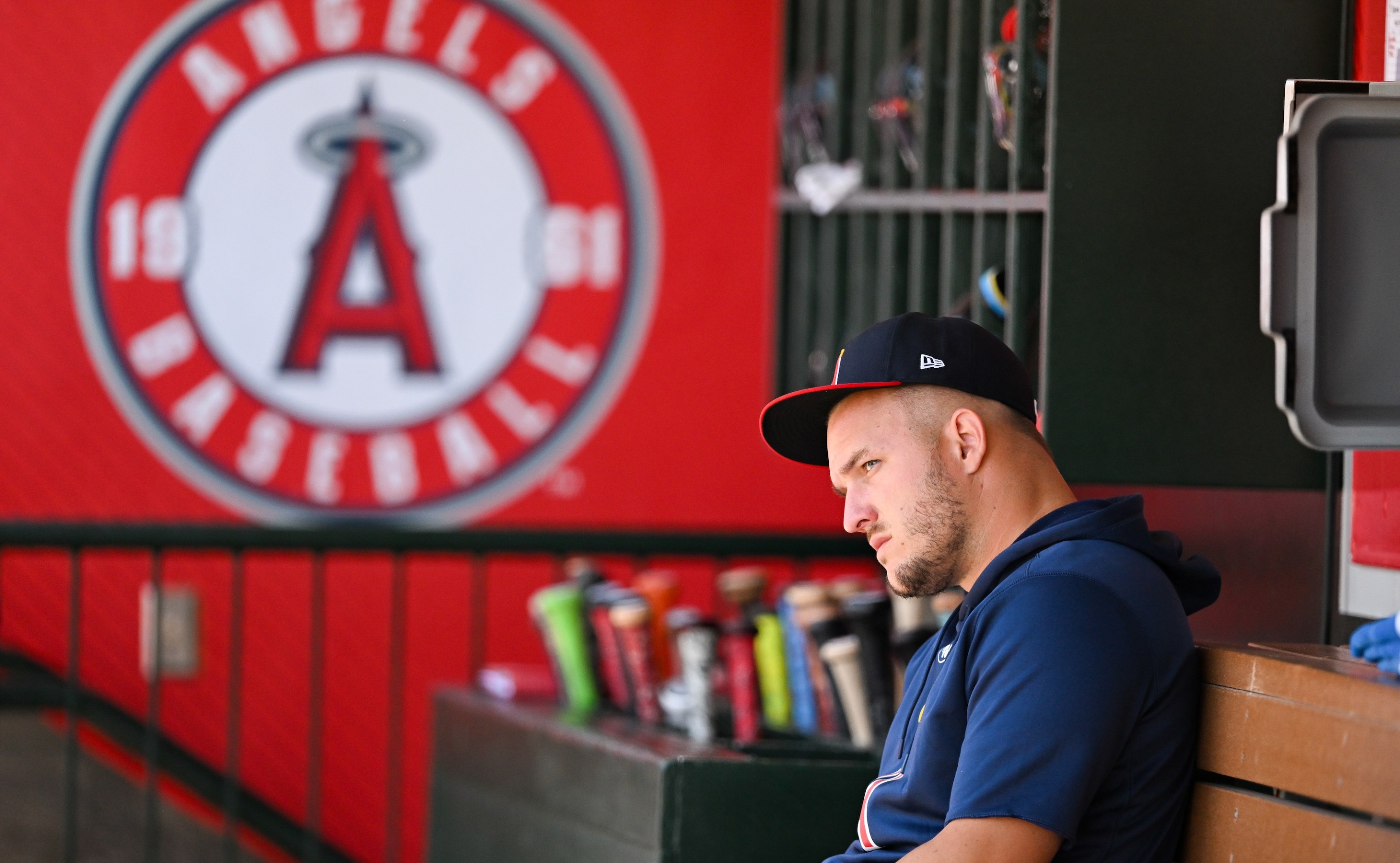 ANAHEIM, CALIFORNIA - JULY 28: Mike Trout #27 of the Los Angeles Angels looks on in the dugout during the regular season game against the Oakland Athletics at Angel Stadium of Anaheim on July 28, 2024 in Anaheim, California. (Photo by Gene Wang/Getty Images)