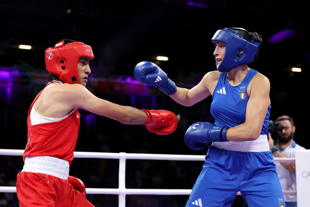 Imane Khelif of Team Algeria and Angela Carini of Team Italy exchange punches