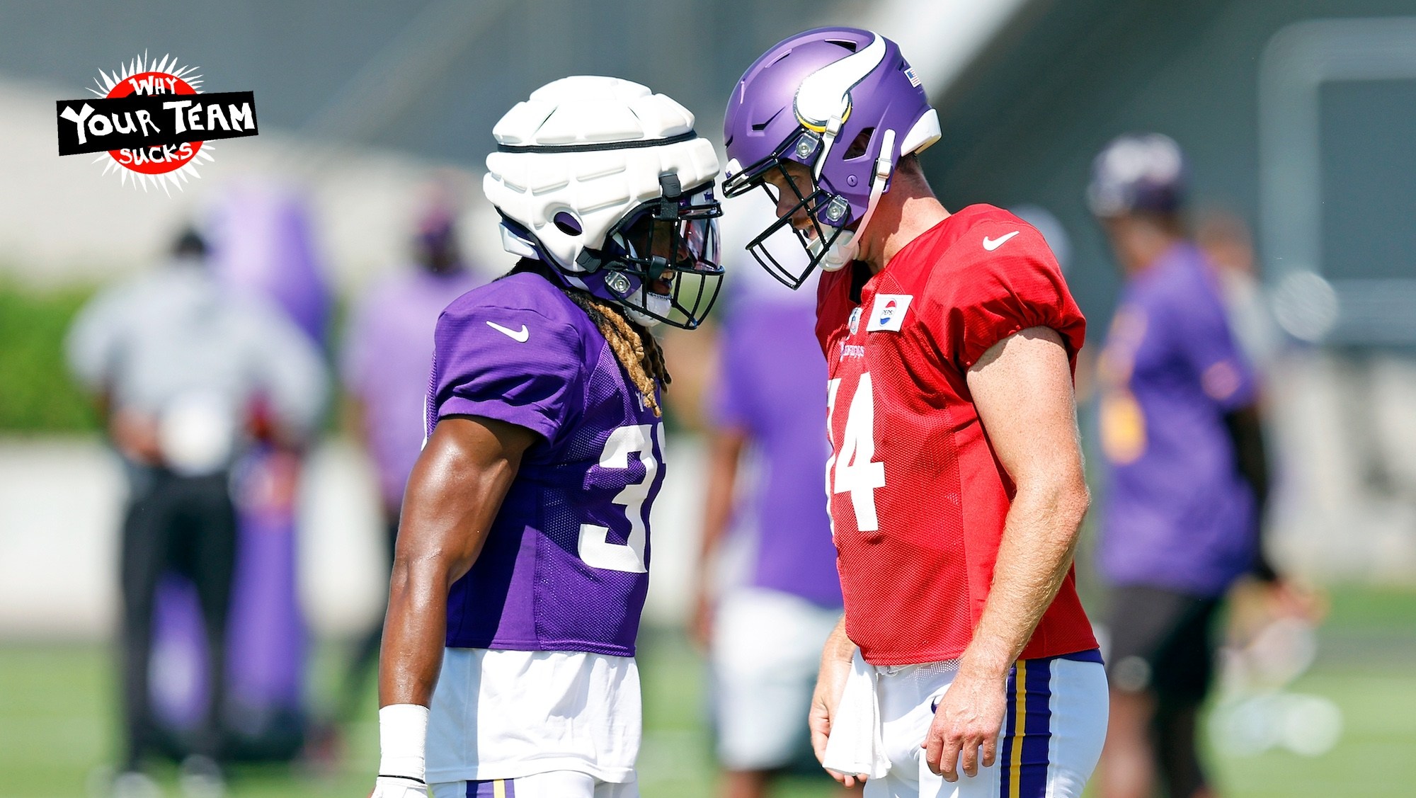 EAGAN, MINNESOTA - AUGUST 02: Aaron Jones #33 interacts with Sam Darnold #14 of the Minnesota Vikings during training camp on August 02, 2024 in Eagan, Minnesota. (Photo by David Berding/Getty Images)