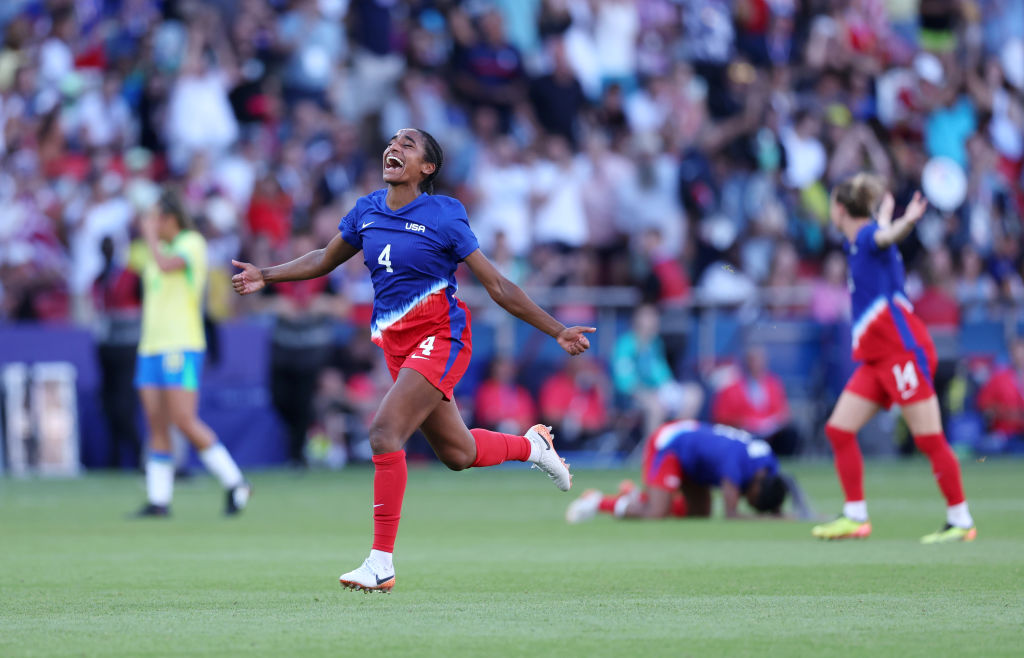 Naomi Girma #4 of Team United States celebrates victory in the Women's Gold Medal match