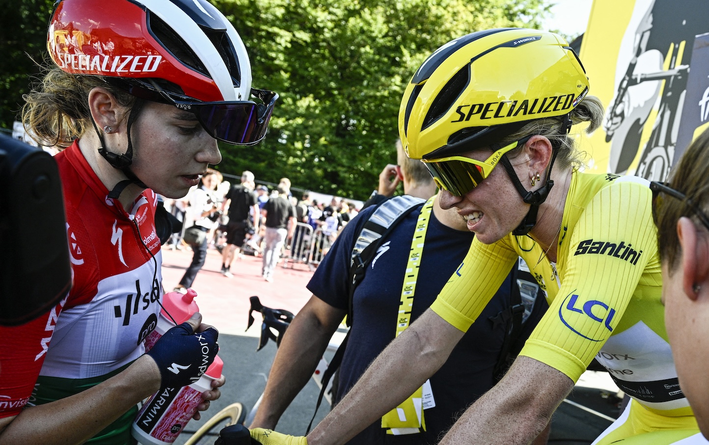 Stage winner Team SD Worx - Protime's Hungarian rider Blanka Vas (L) speaks with Team SD Worx - Protime's Dutch rider Demi Vollering after the 5th stage (out of 8) of the third edition of the Women's Tour de France cycling race, a 152.5 km between Bastogne in southeastern Belgium and Amneville in northeastern France, on August 15, 2024. (Photo by JULIEN DE ROSA / AFP)