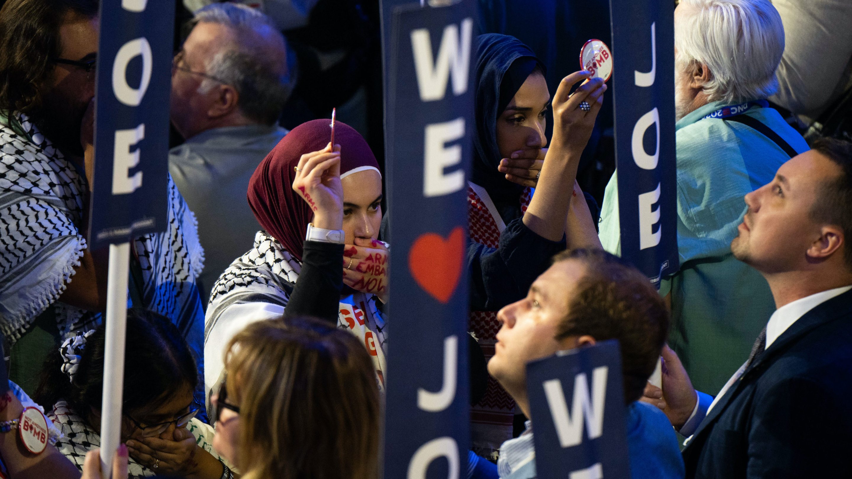 Attendees calling for a ceasefire in Gaza demonstrate as President Joe Biden deliver the keynote speech during the first day of the Democratic National Convention on August 19, 2024,