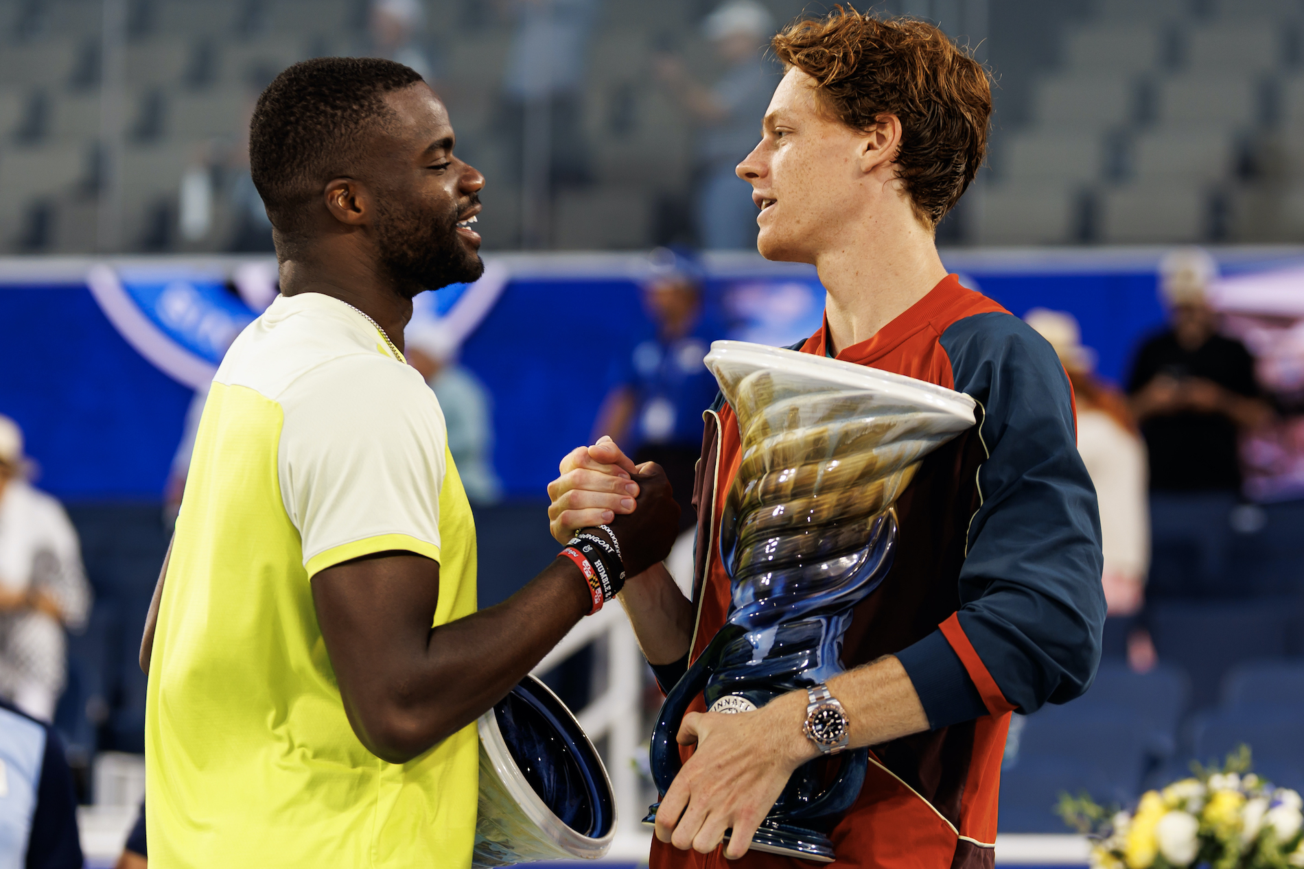 Jannik Sinner of Italy shakes hands with Frances Tiafoe of the United States after beating him in the final of the Cincinnati Open