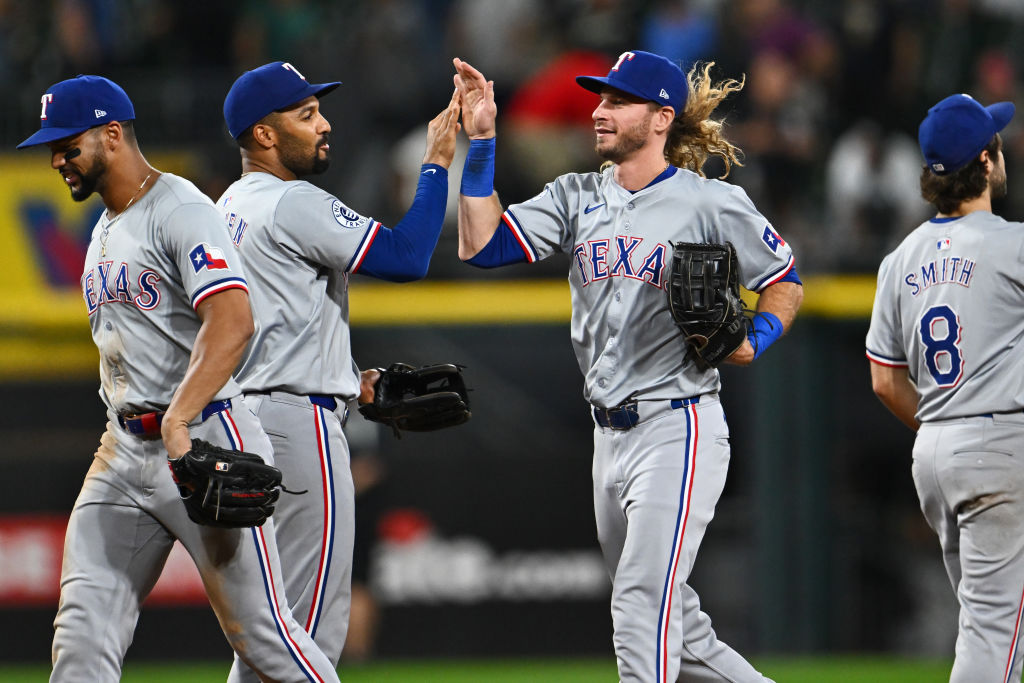 Travis Jankowski celebrates after the Rangers win