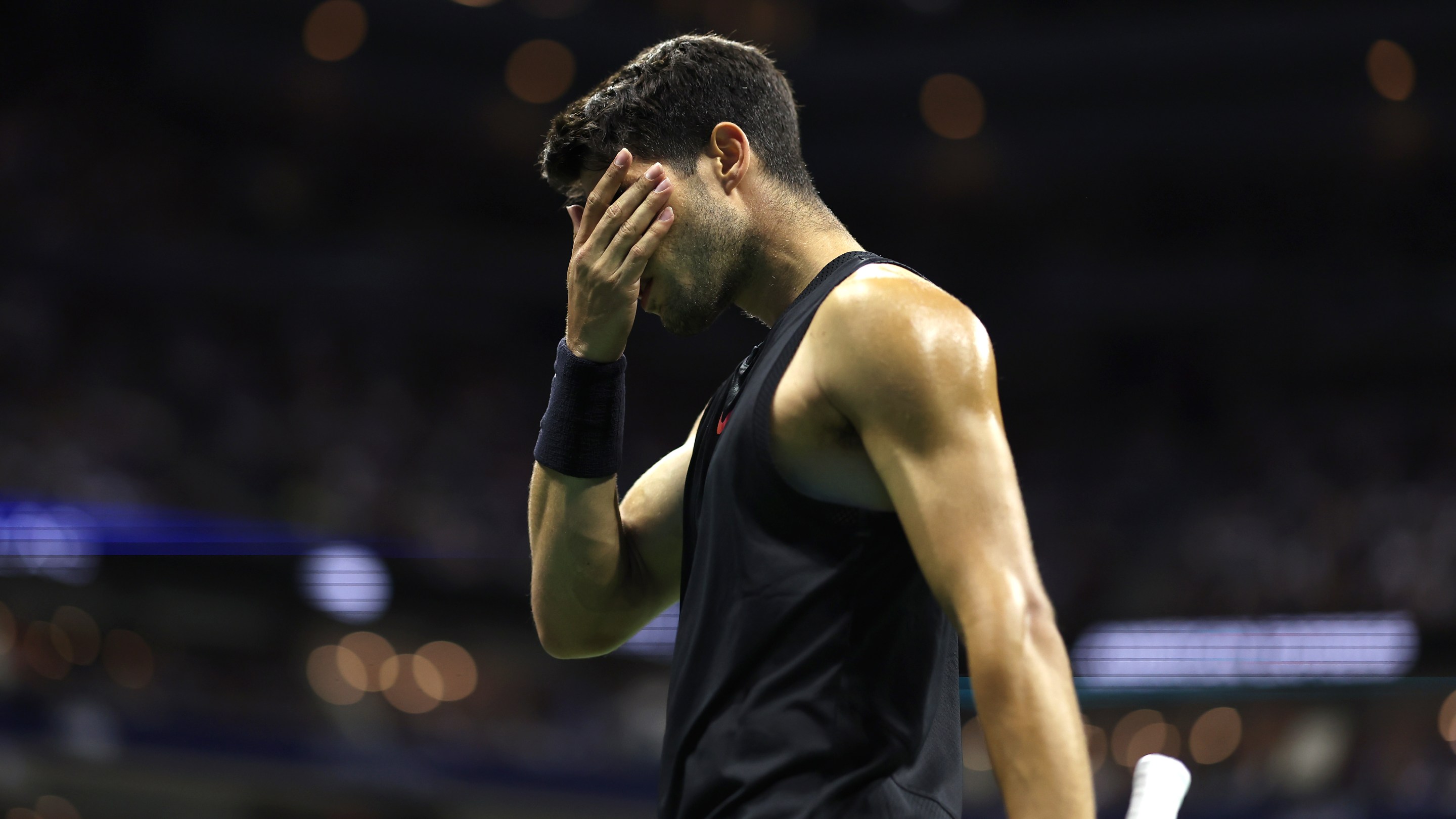 NEW YORK, NEW YORK - AUGUST 29: Carlos Alcaraz of Spain reacts after a point against Botic van De Zandschulp of the Netherlands during their Men's Singles Second Round match on Day Four of the 2024 US Open at USTA Billie Jean King National Tennis Center on August 29, 2024 in the Flushing neighborhood of the Queens borough of New York City. (Photo by Luke Hales/Getty Images)