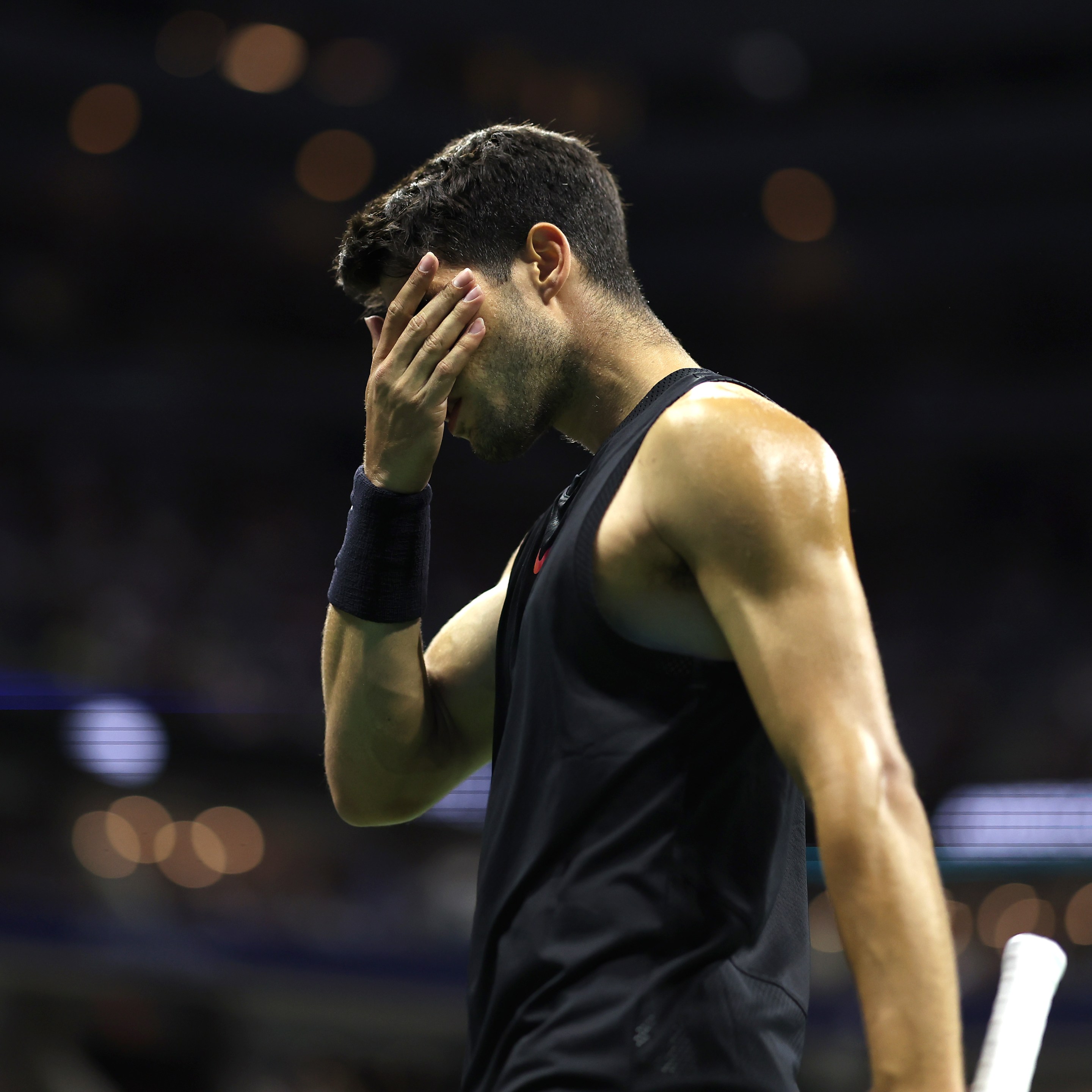NEW YORK, NEW YORK - AUGUST 29: Carlos Alcaraz of Spain reacts after a point against Botic van De Zandschulp of the Netherlands during their Men's Singles Second Round match on Day Four of the 2024 US Open at USTA Billie Jean King National Tennis Center on August 29, 2024 in the Flushing neighborhood of the Queens borough of New York City. (Photo by Luke Hales/Getty Images)