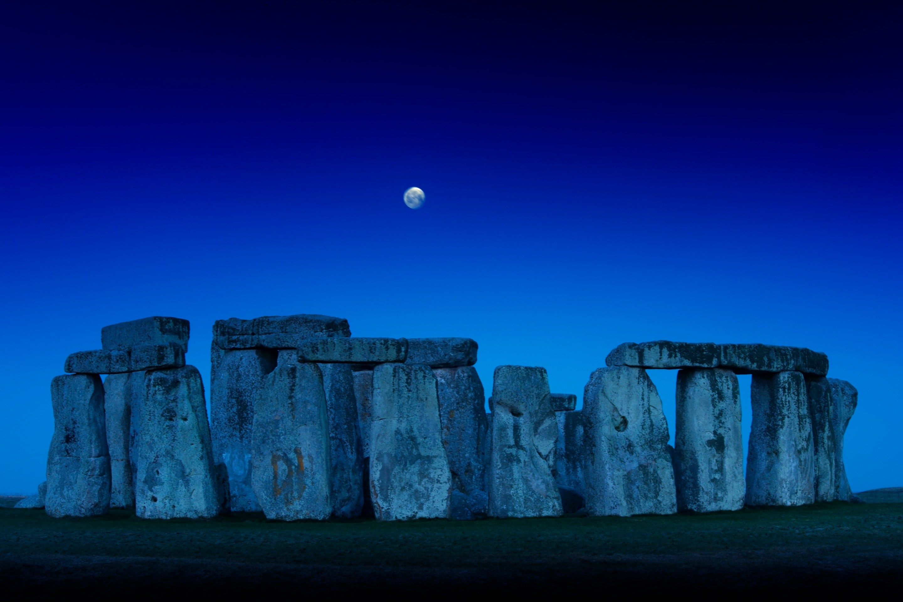 Stonehenge, Wiltshire, circa 2015. General view at dusk with the Moon above the stones. (Photo by English Heritage/Heritage Images/Getty Images)