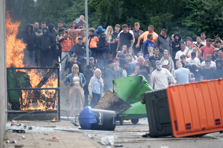 Riots outside of the Holiday Inn Express in Manvers, which is being used as an asylum hotel, on August 4, 2024 in Rotherham, United Kingdom.